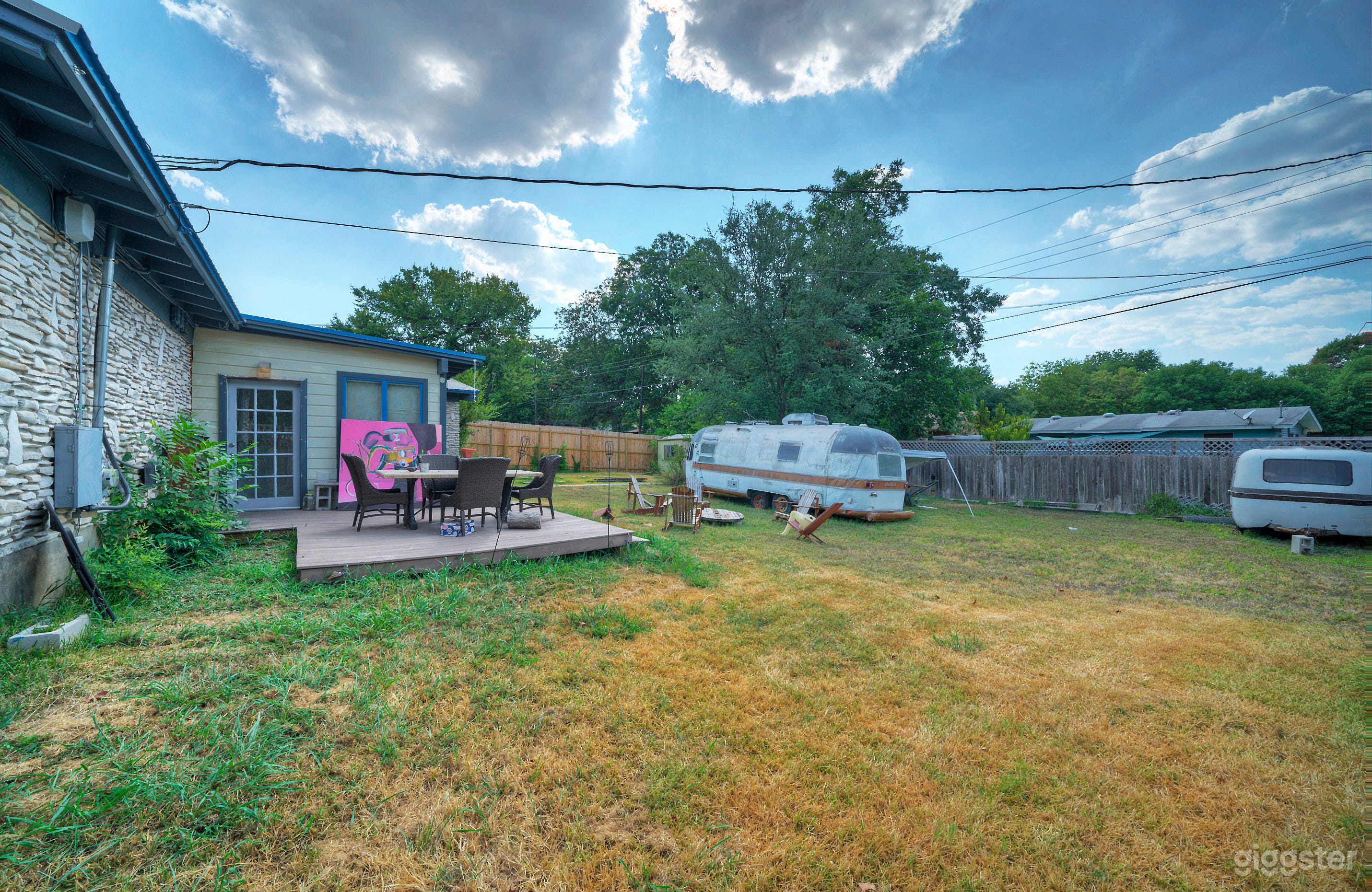 Random Airstream with cool Mural in a Backyard Photo 2