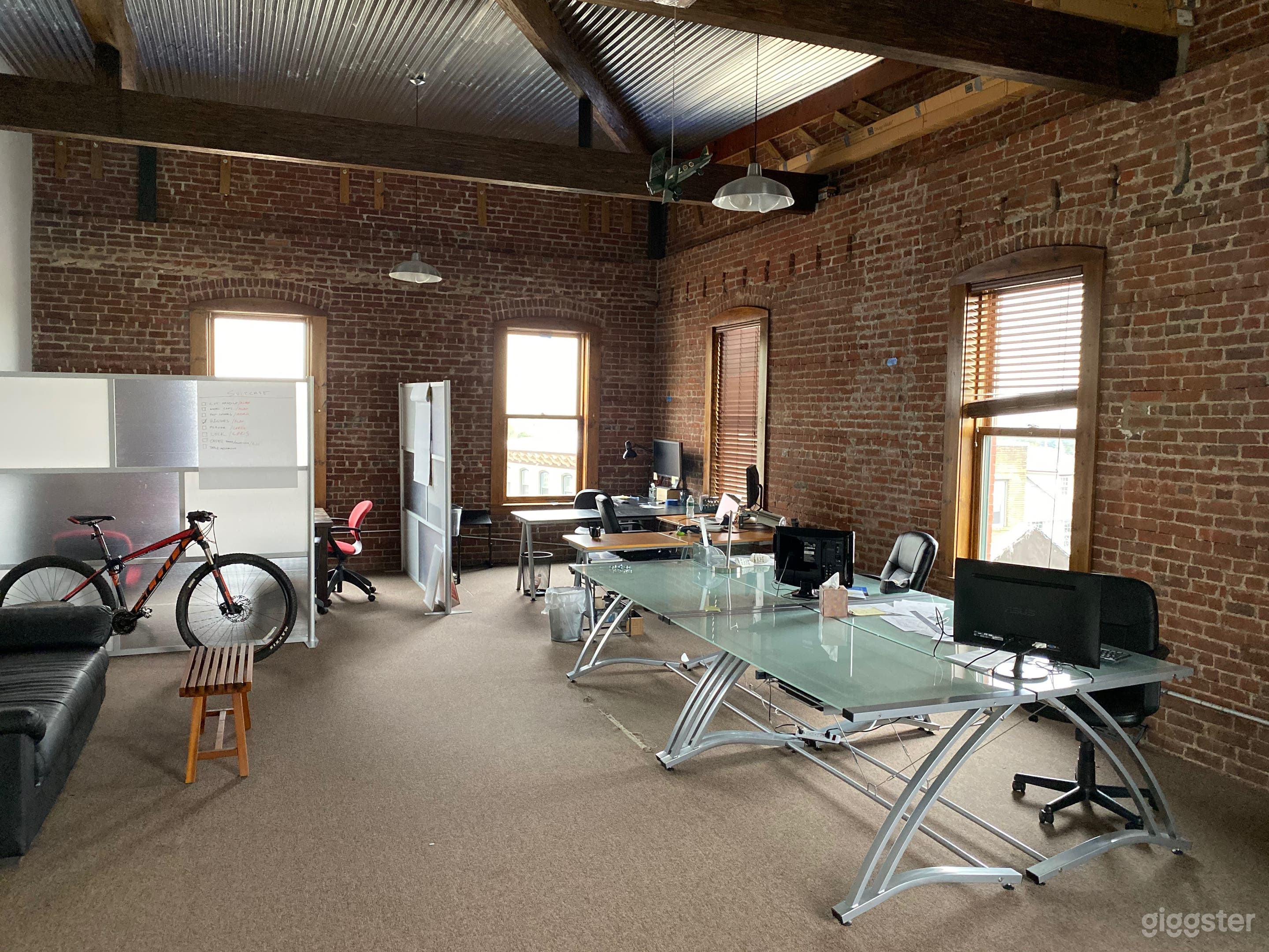 Exposed brick loft space, open floor plan -Views   Photo 4