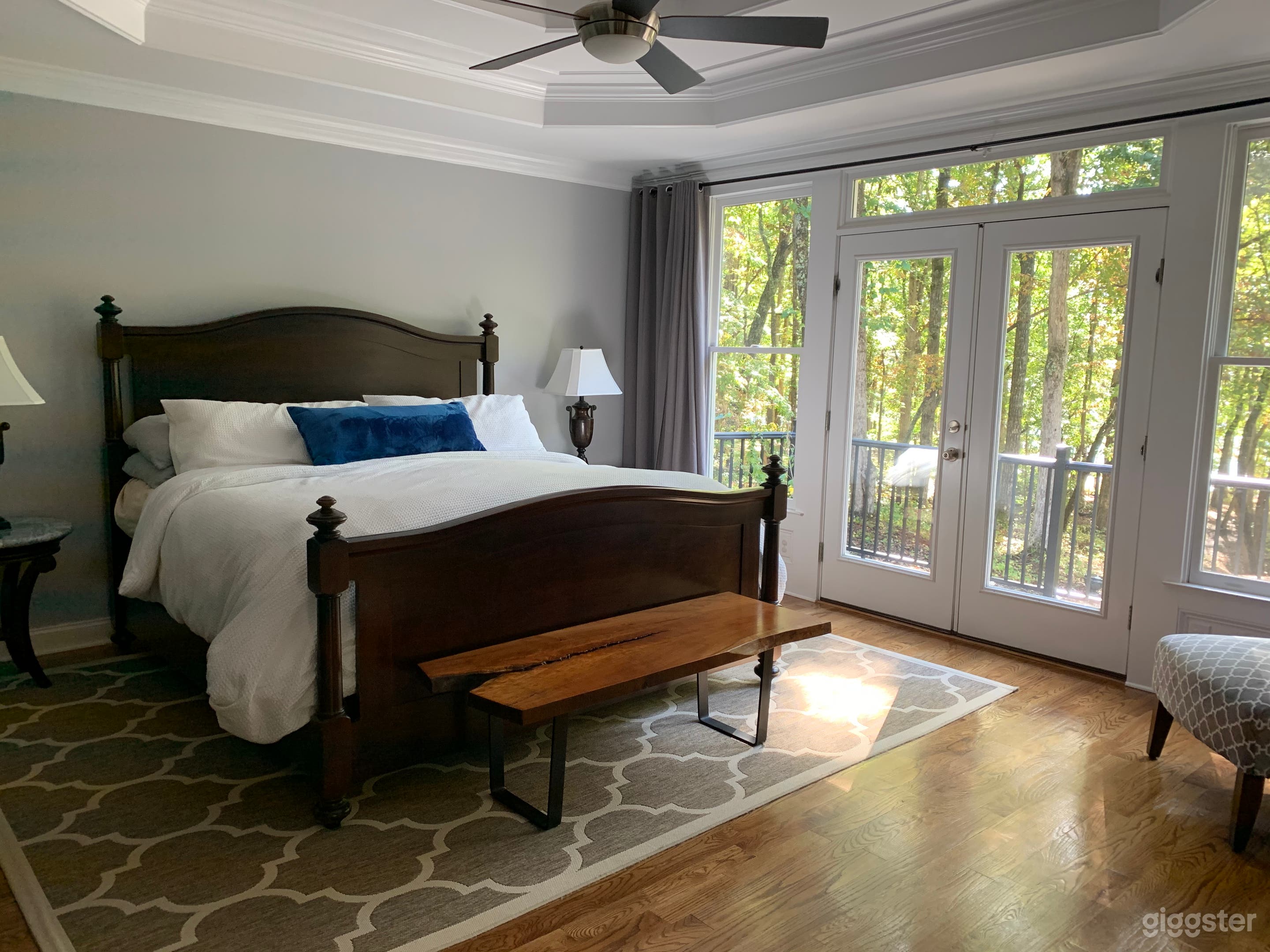 Master bedroom on main level.  Double tray ceiling and wood floors.