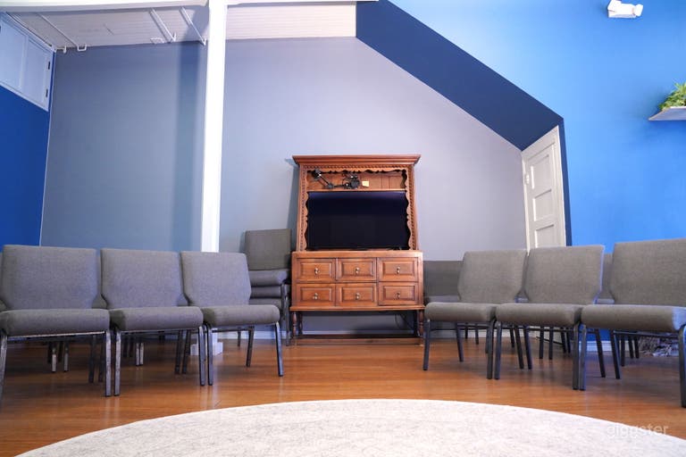  webcasting setup with microphones, computer and large screen 