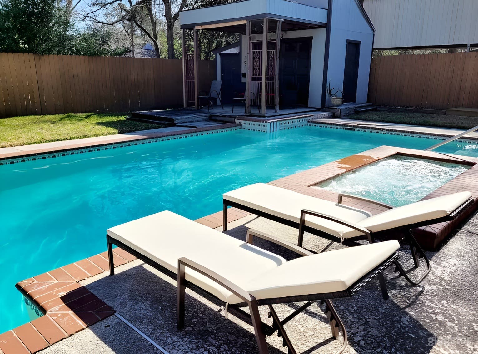 Backyard Pool & Lounge with Spa Photo 3