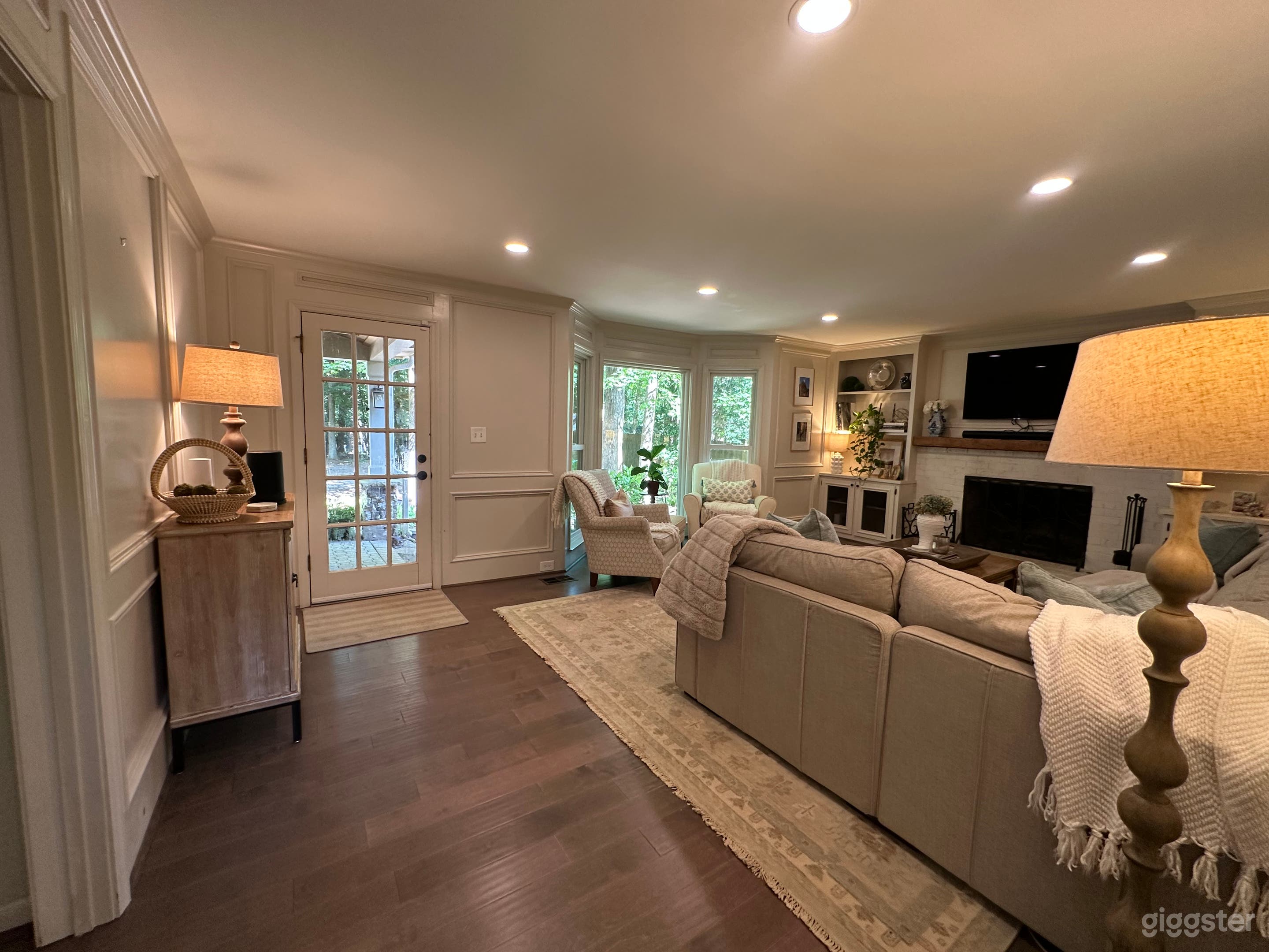 1980s brick with patio and big wooded backyard! Photo 1