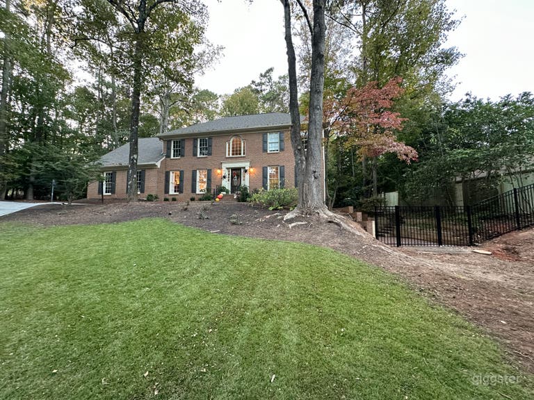  1980s brick with patio and big wooded backyard! 