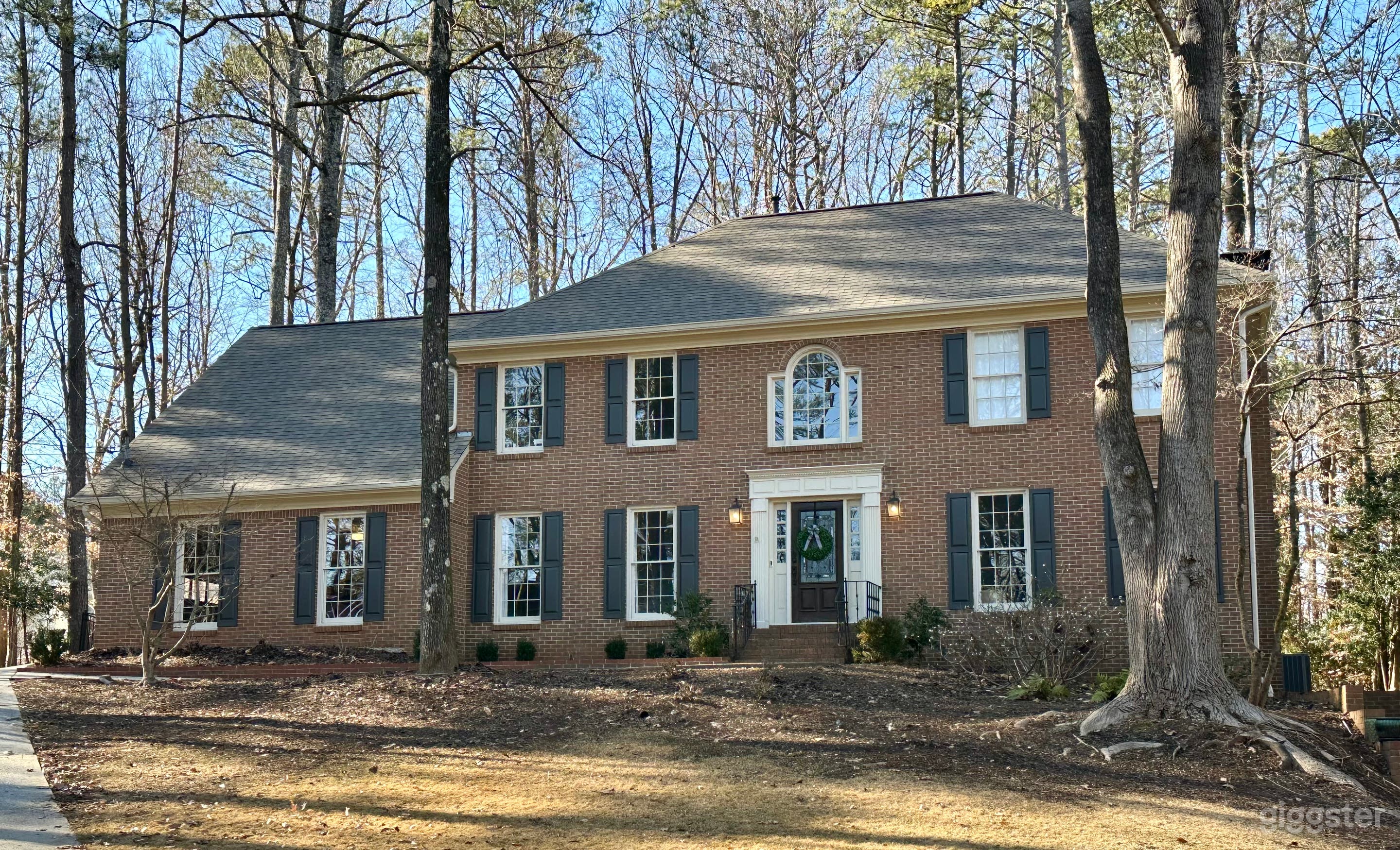 1980s brick with patio and big wooded backyard! Photo 4