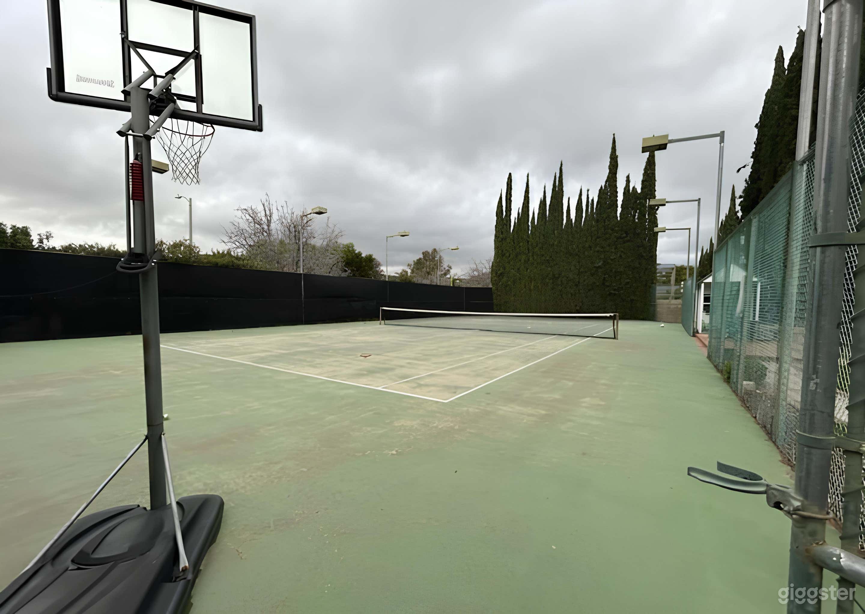 Regulation-sized Fenced Tennis Court Photo 2