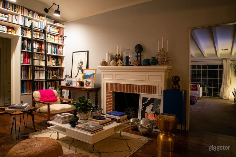  Library Sitting Room with Fireplace + Built-In Bookcase with Ladder (Night) 