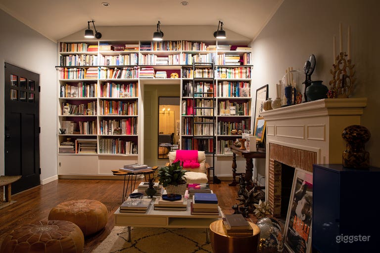  Library Sitting Room with Fireplace + Built-In Bookcase with Ladder (Night) 