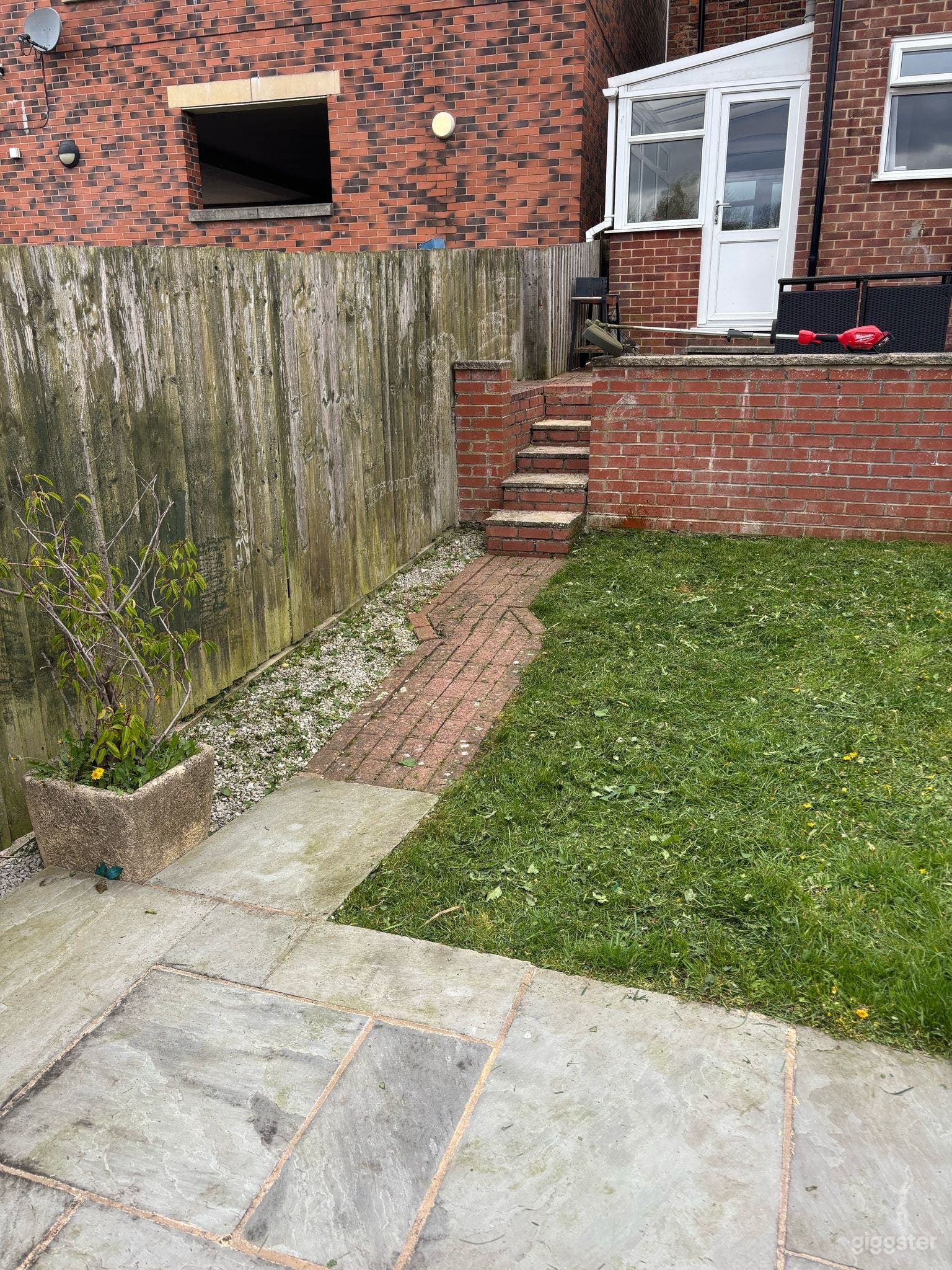 Private Backyard with Patio and Green Space Photo 3