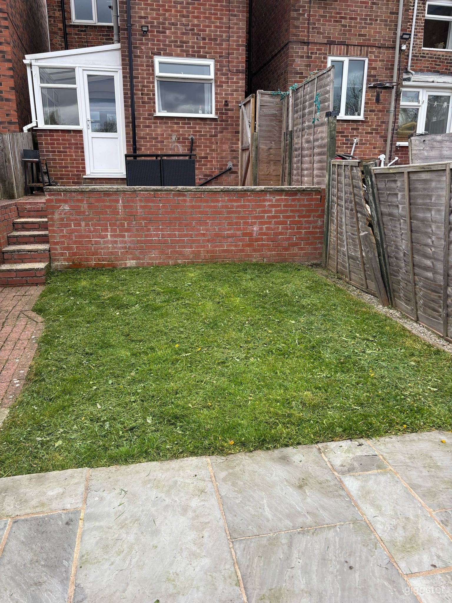 Private Backyard with Patio and Green Space Photo 2