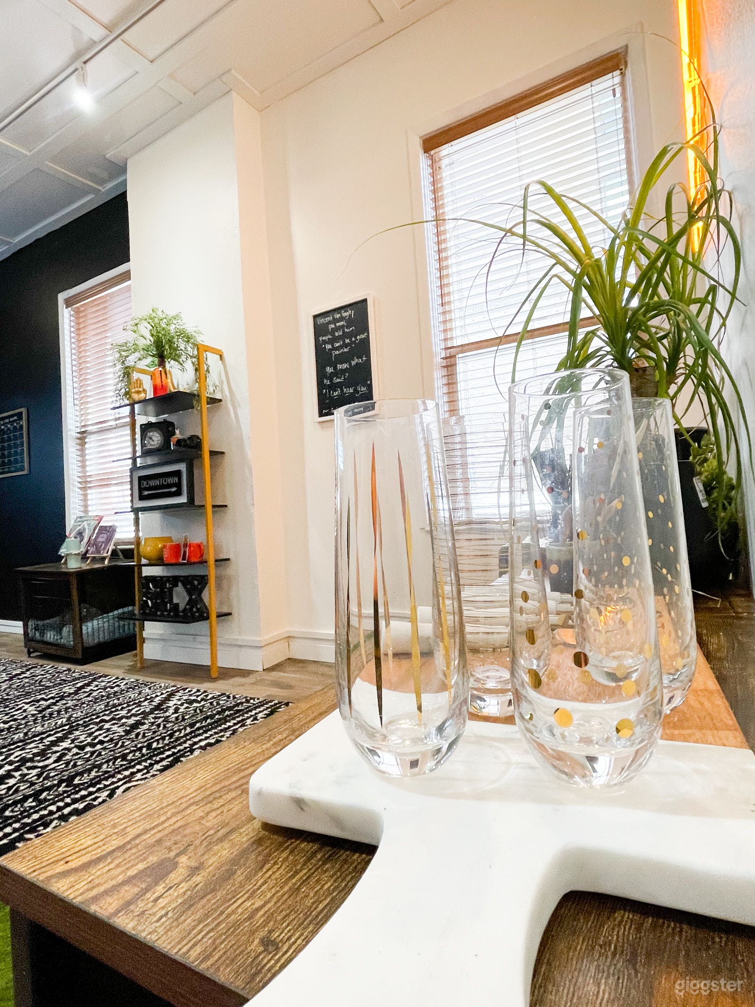 A modern Spokane event venue that offers 2 lounge areas and 2 bathrooms and 2 kitchen areas.