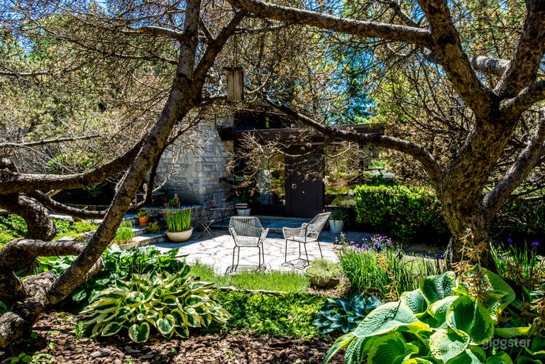  View of the front patio though the trees. 