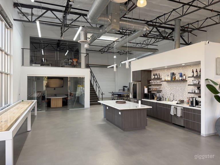  Kitchen area, conference room, and open area with shuffle board and ping pong 
