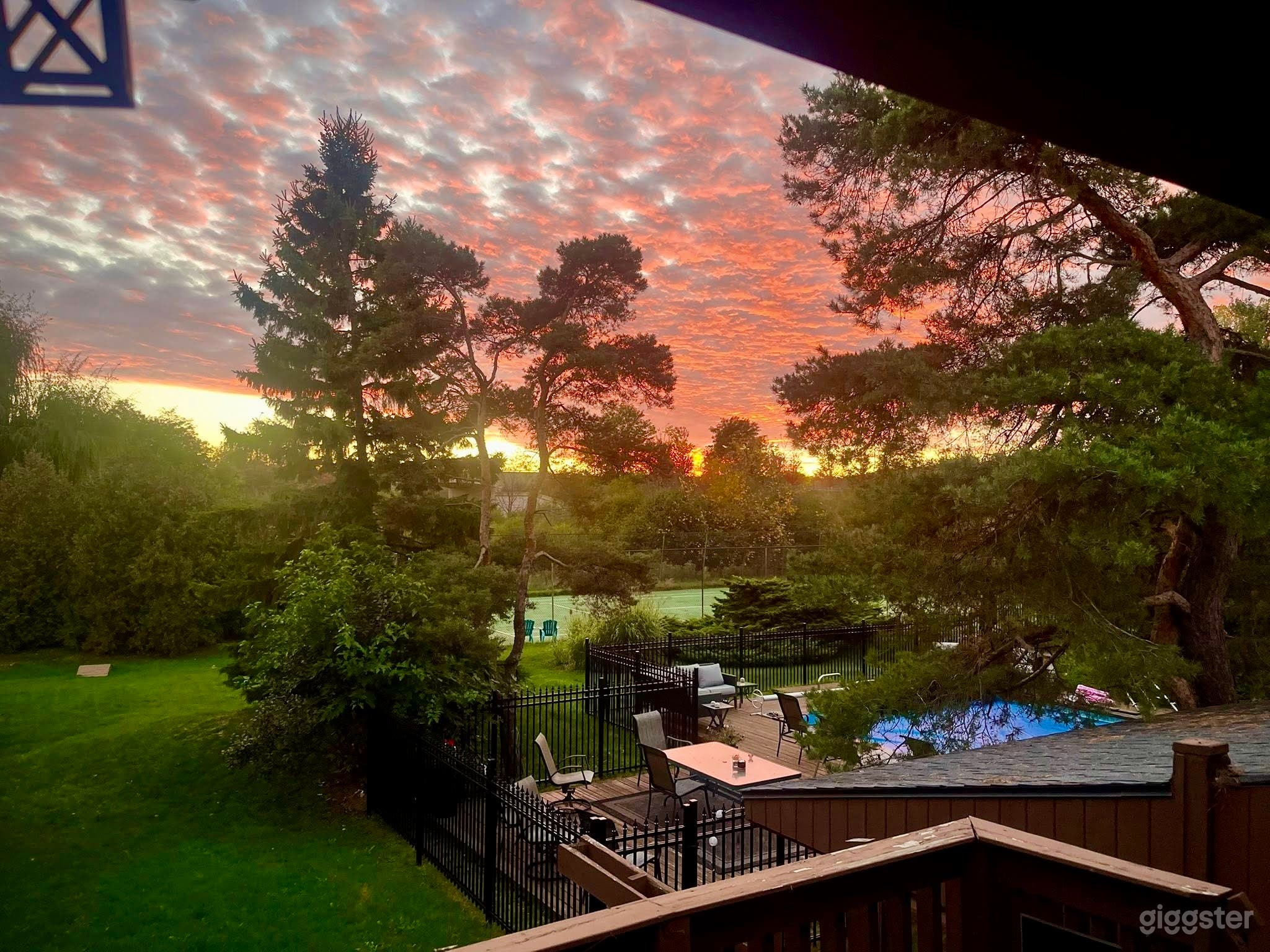 Summer exterior shot from master bedroom porch