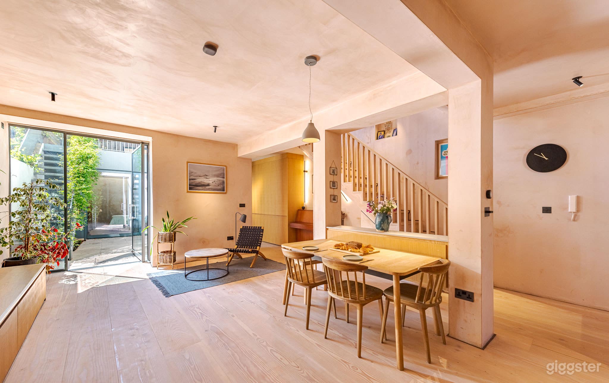 Hackney House with Raw, Plaster Walls Photo 1