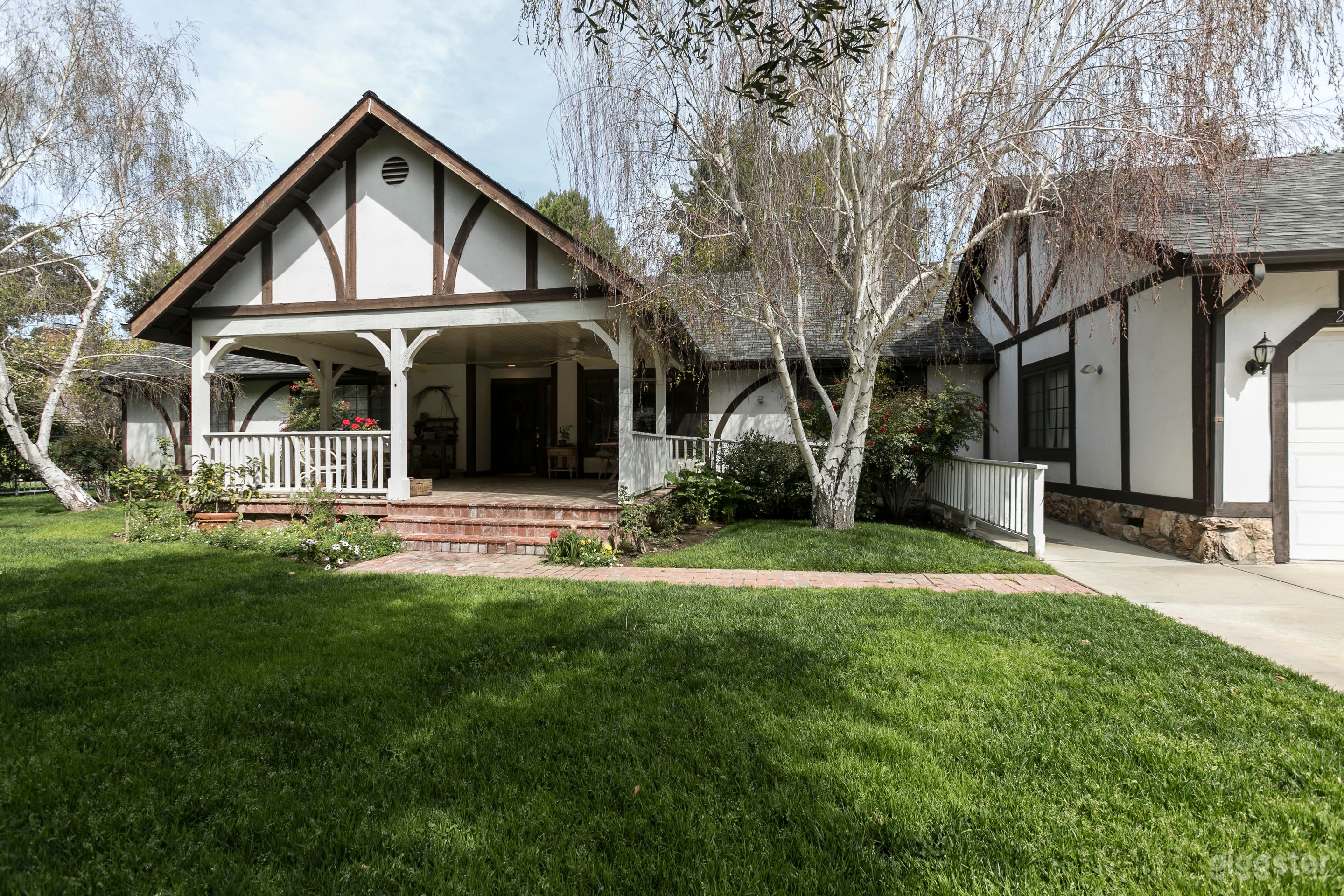 English Tudor Style With Skateboard Ramp In Yard Photo 1