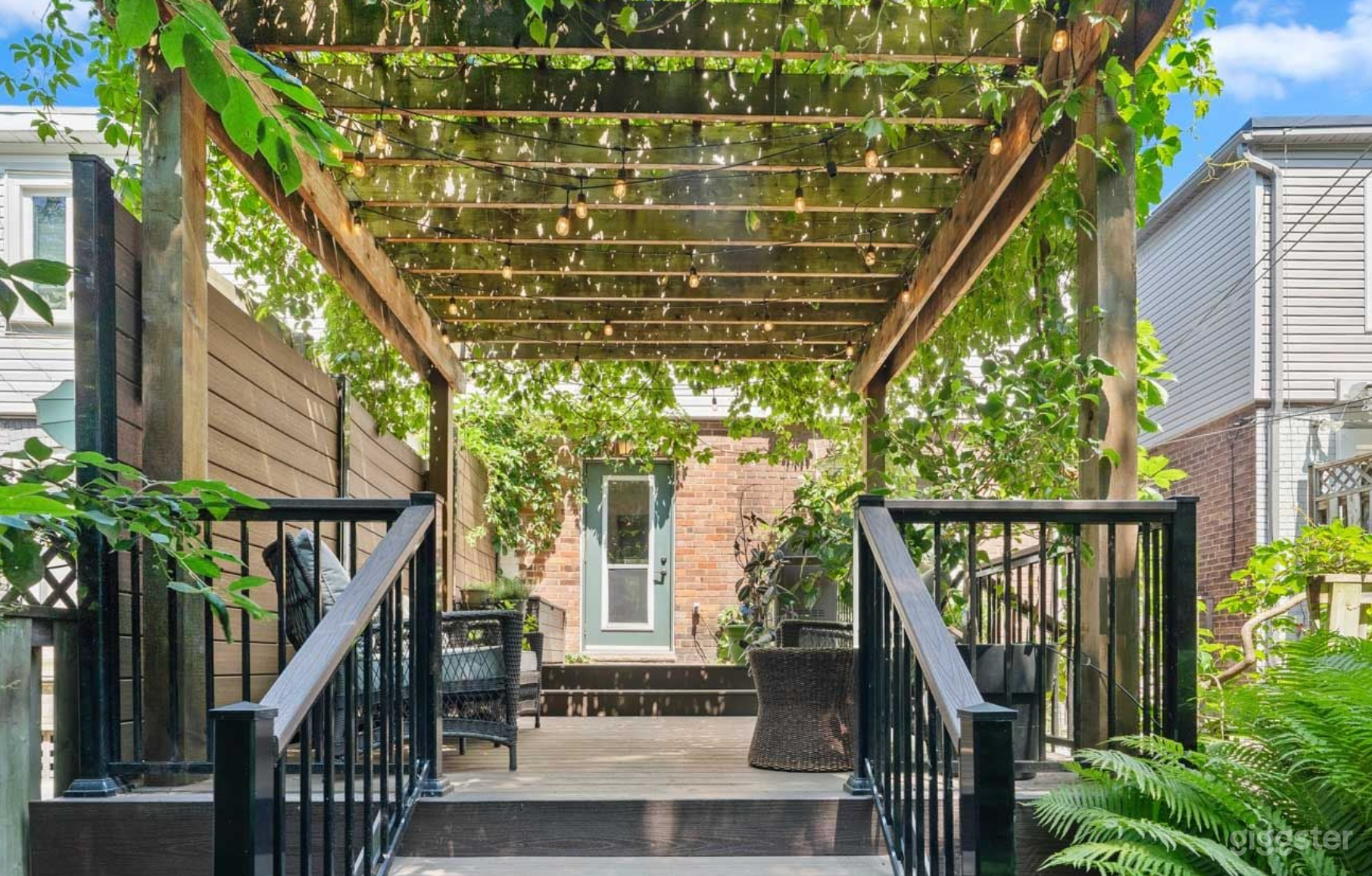 Boutique-Style Home with Enchanted Outdoor Living Space Photo 1