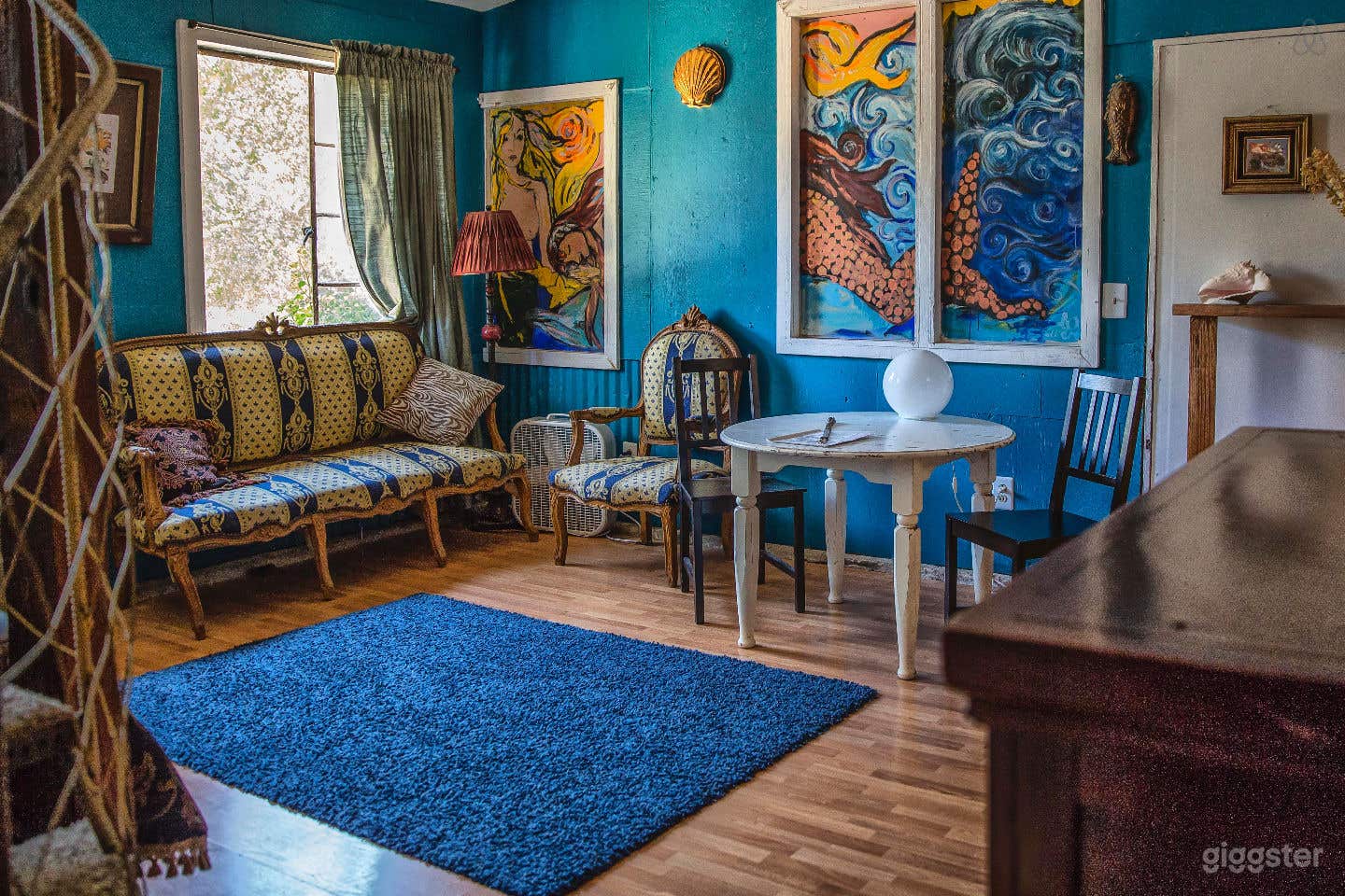 Mermaid Room with spiral staircase and loft. 