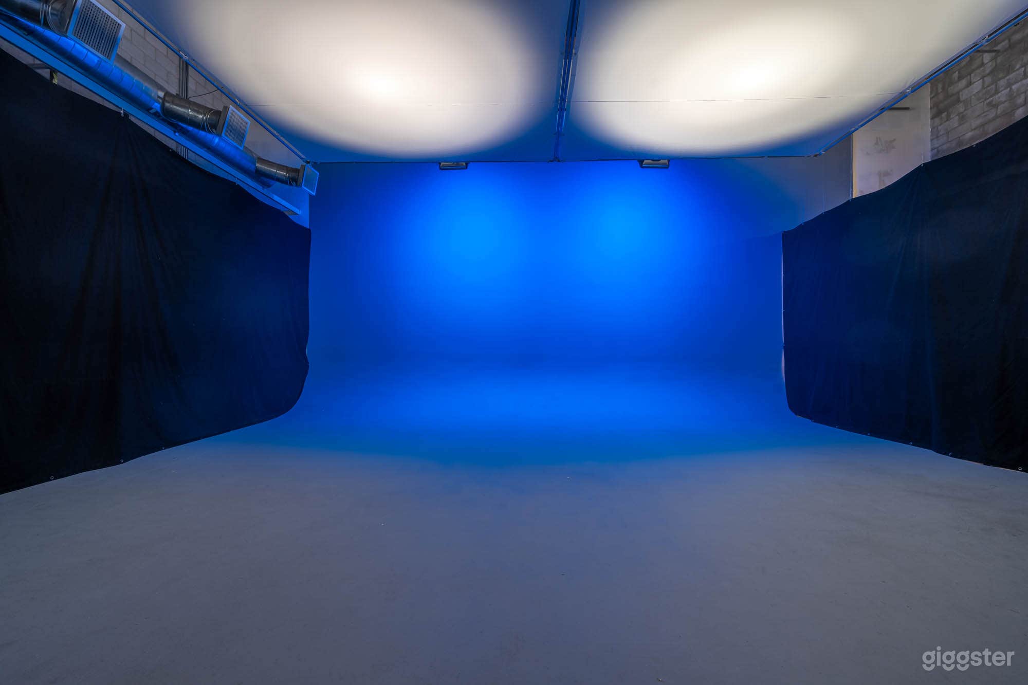 CYC Wall w/ Blue Accent Lighting