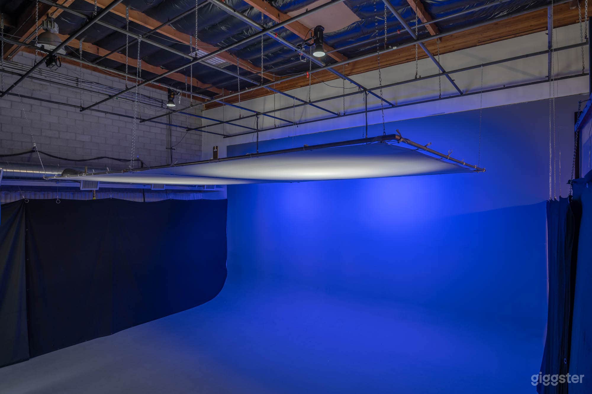 CYC Wall w/ Blue Accent Lighting