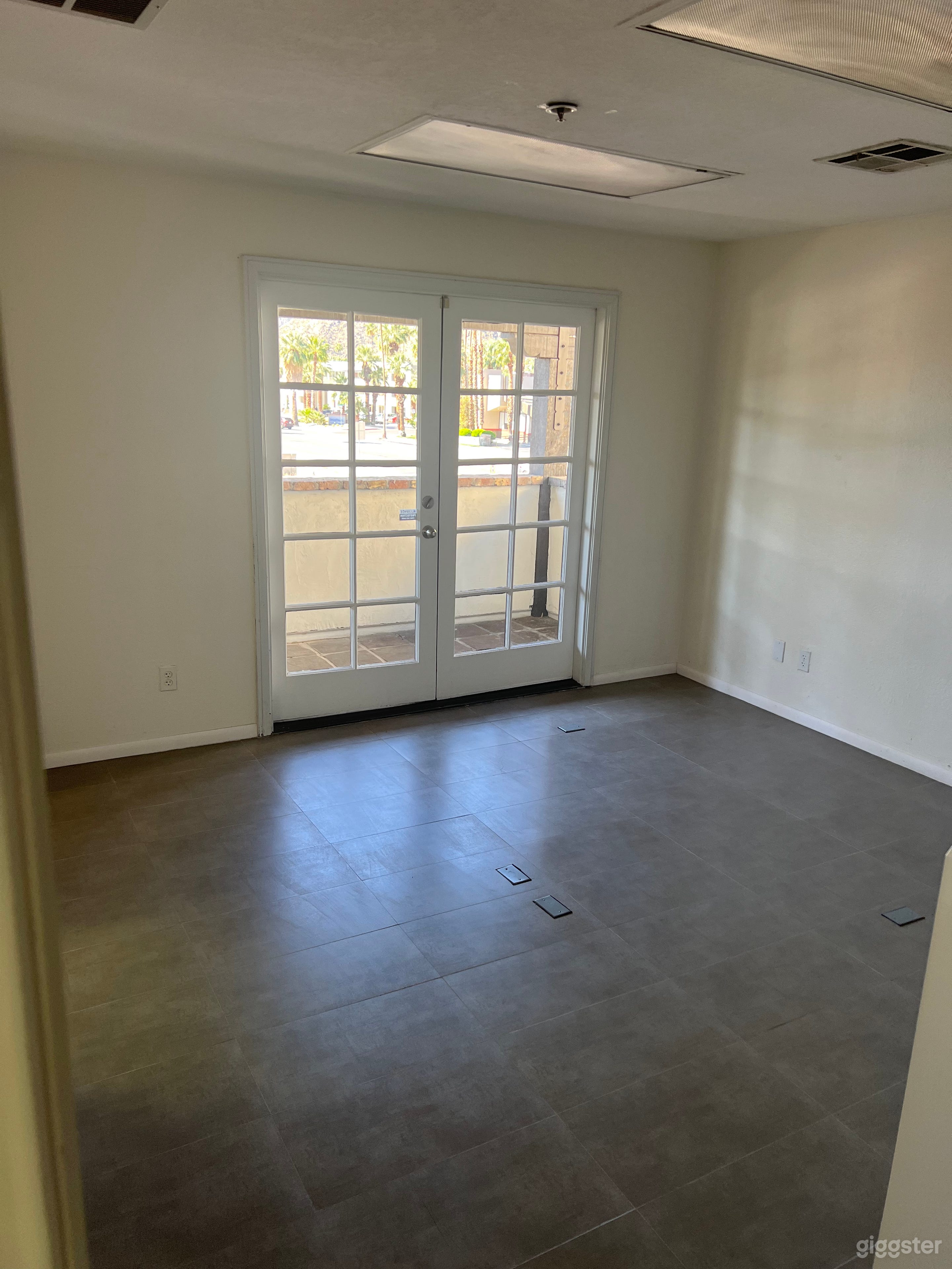 Studio in Spanish Style Business Building Photo 1