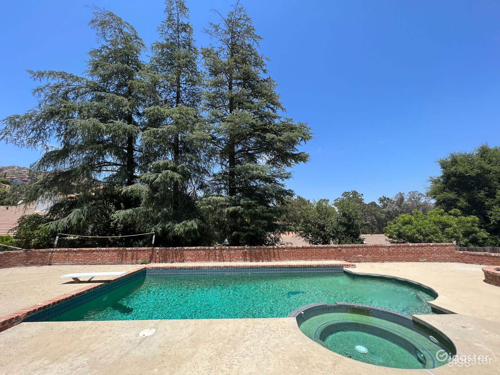 Large Salt-Water Pool with Jacuzzi and Lighting Photo 4