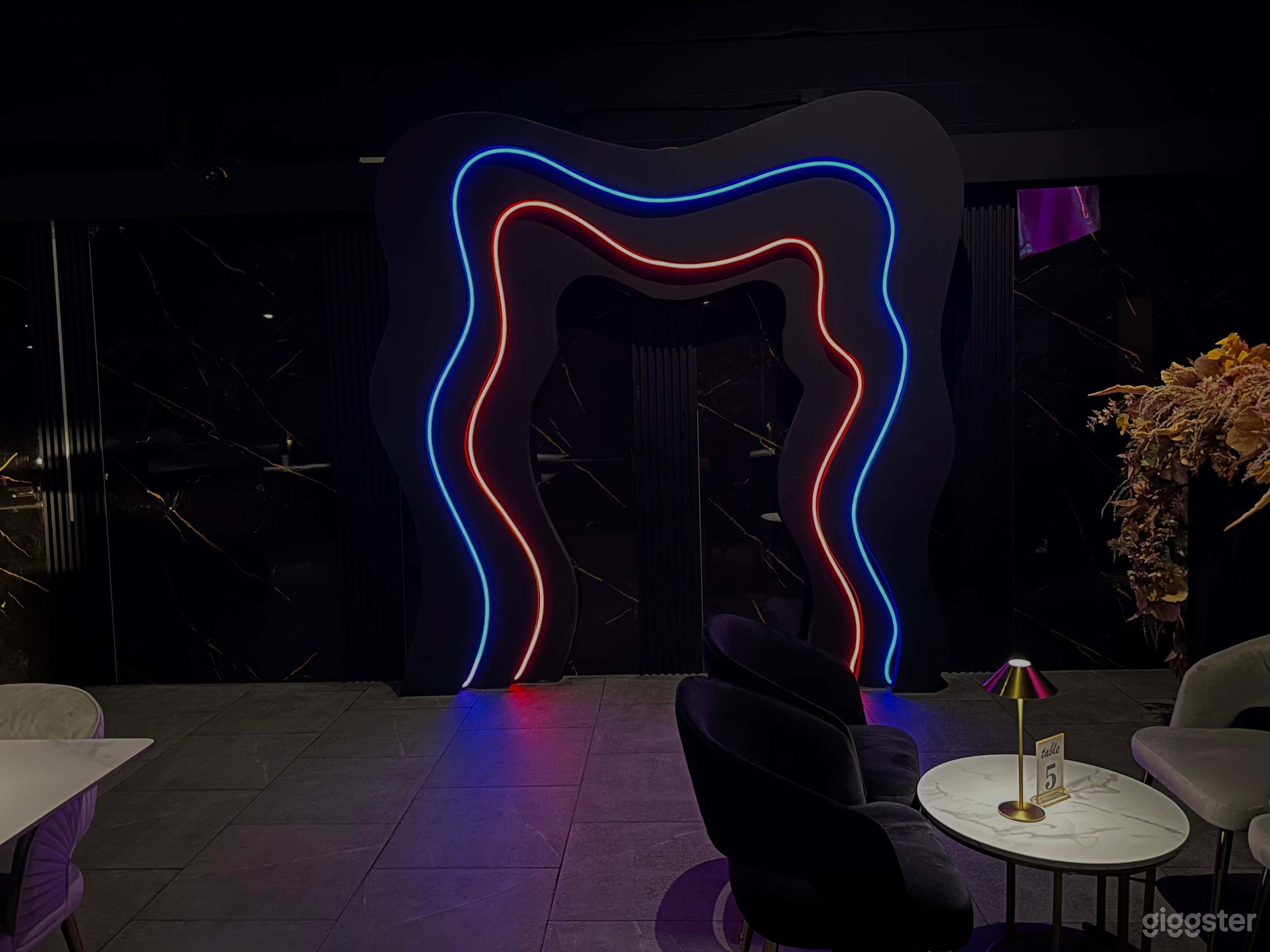 Cinematic Dining Space with Programmable LED Ambience Photo 1
