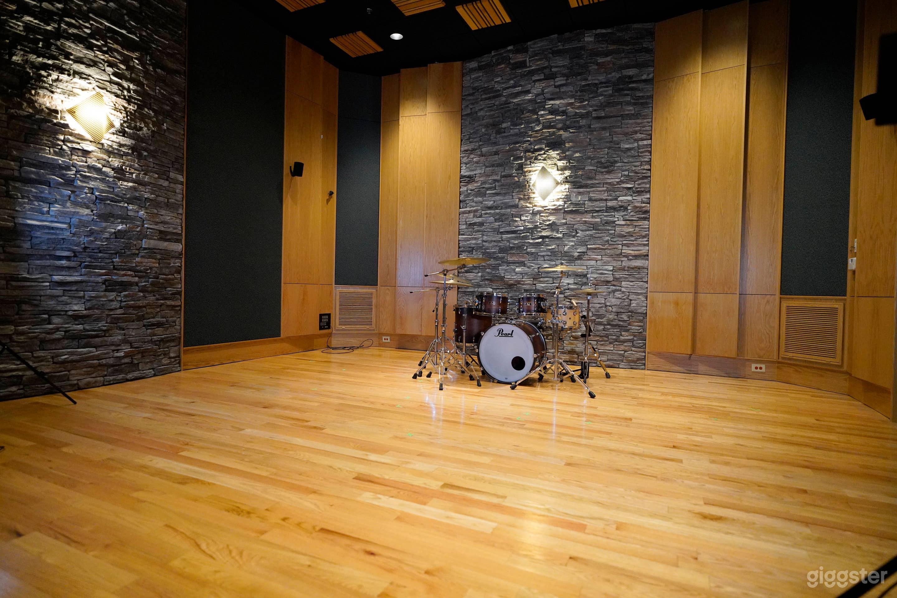 Live Room (Studio 1) equipped with Steinway Model O Piano and house drums. 