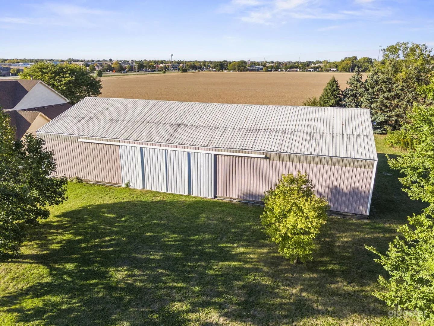 5,000 sq. foot barn with farmland behind