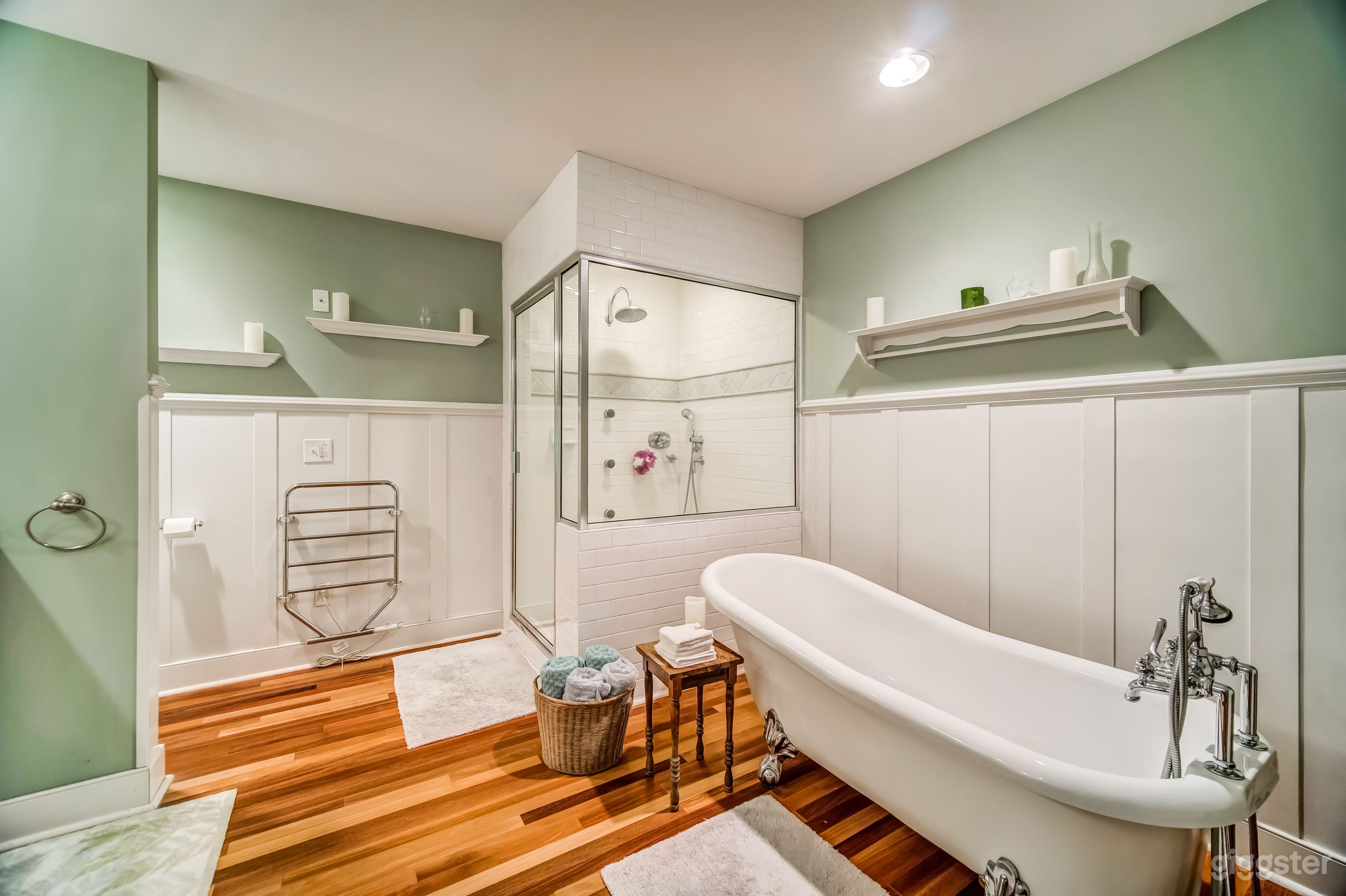 Teak flooring, clawfoot tub, gorgeous shower, twin marble sinks in the master bath.  