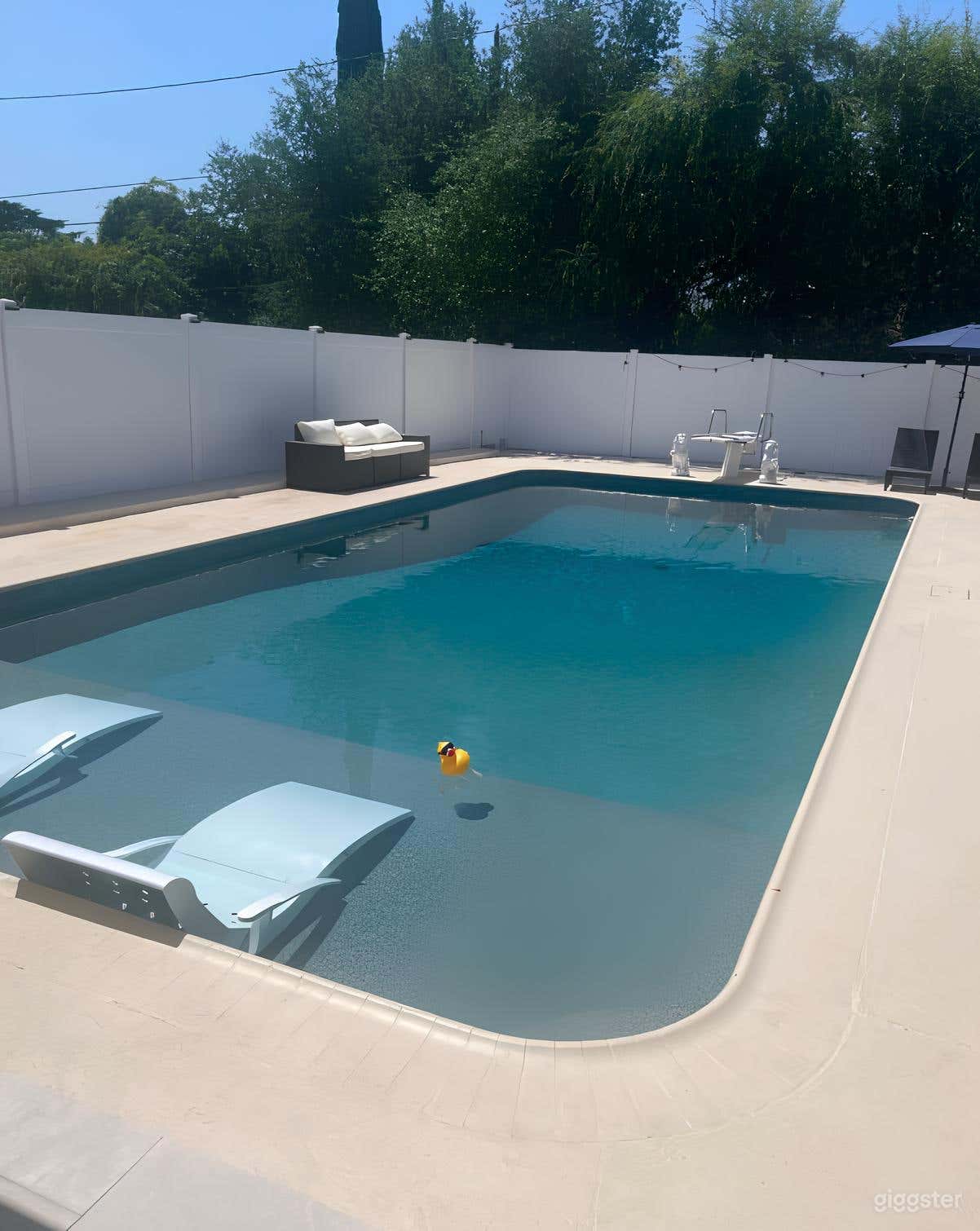 Nice Backyard Pool with Covered Patio Photo 2