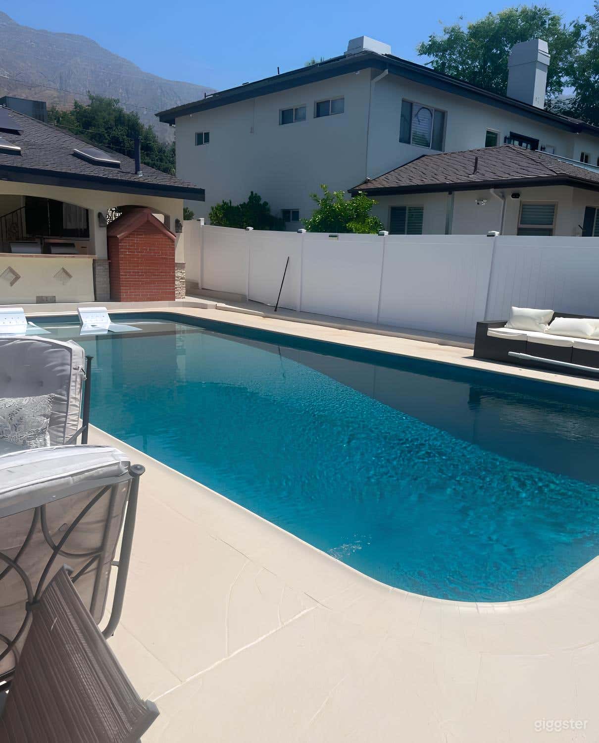 Nice Backyard Pool with Covered Patio Photo 1