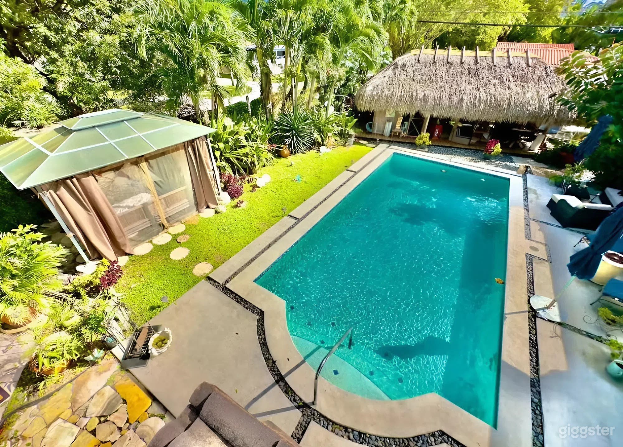 Private Heated Saltwater Pool with Tiki Garden Oasis Photo 4