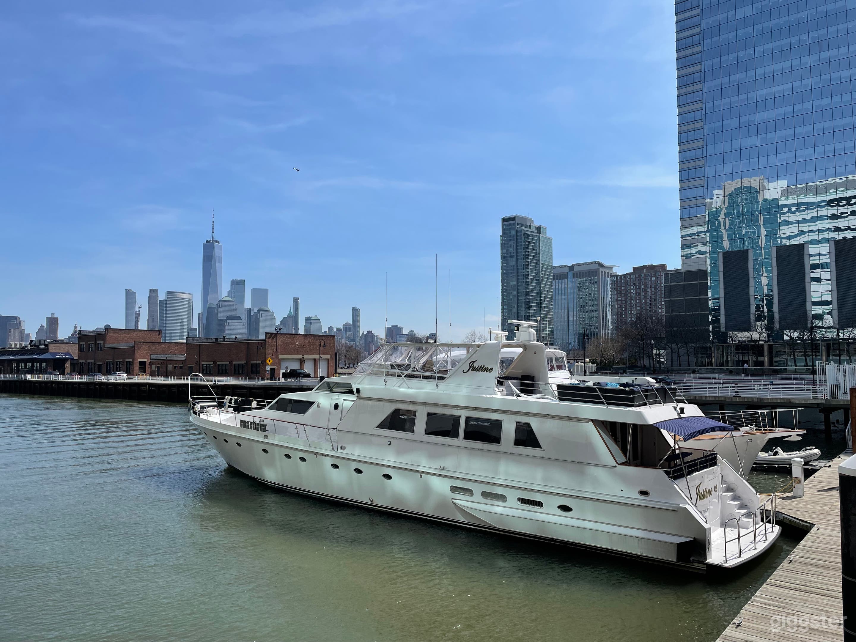 Upscale Yacht Club and Marina with Skyline View Photo 1