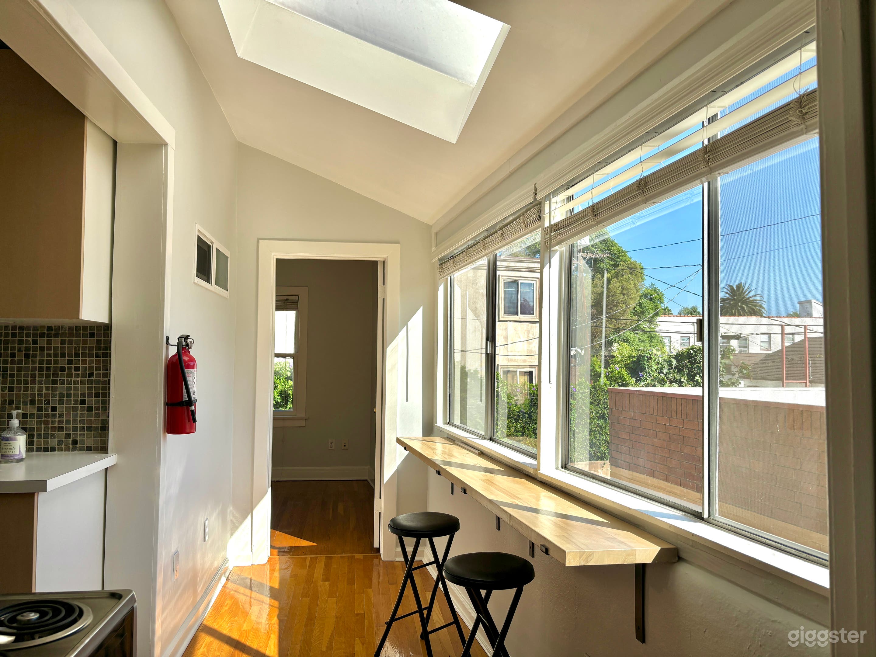 Kitchen bar area with skylight #1