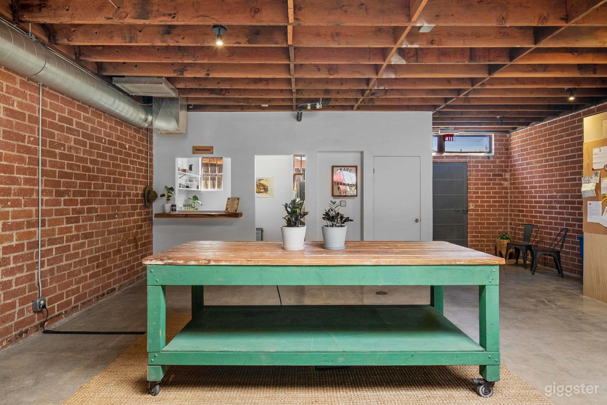 high table with bathroom and kitchenette