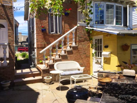 Vibrant Backyard With Table Photo 1