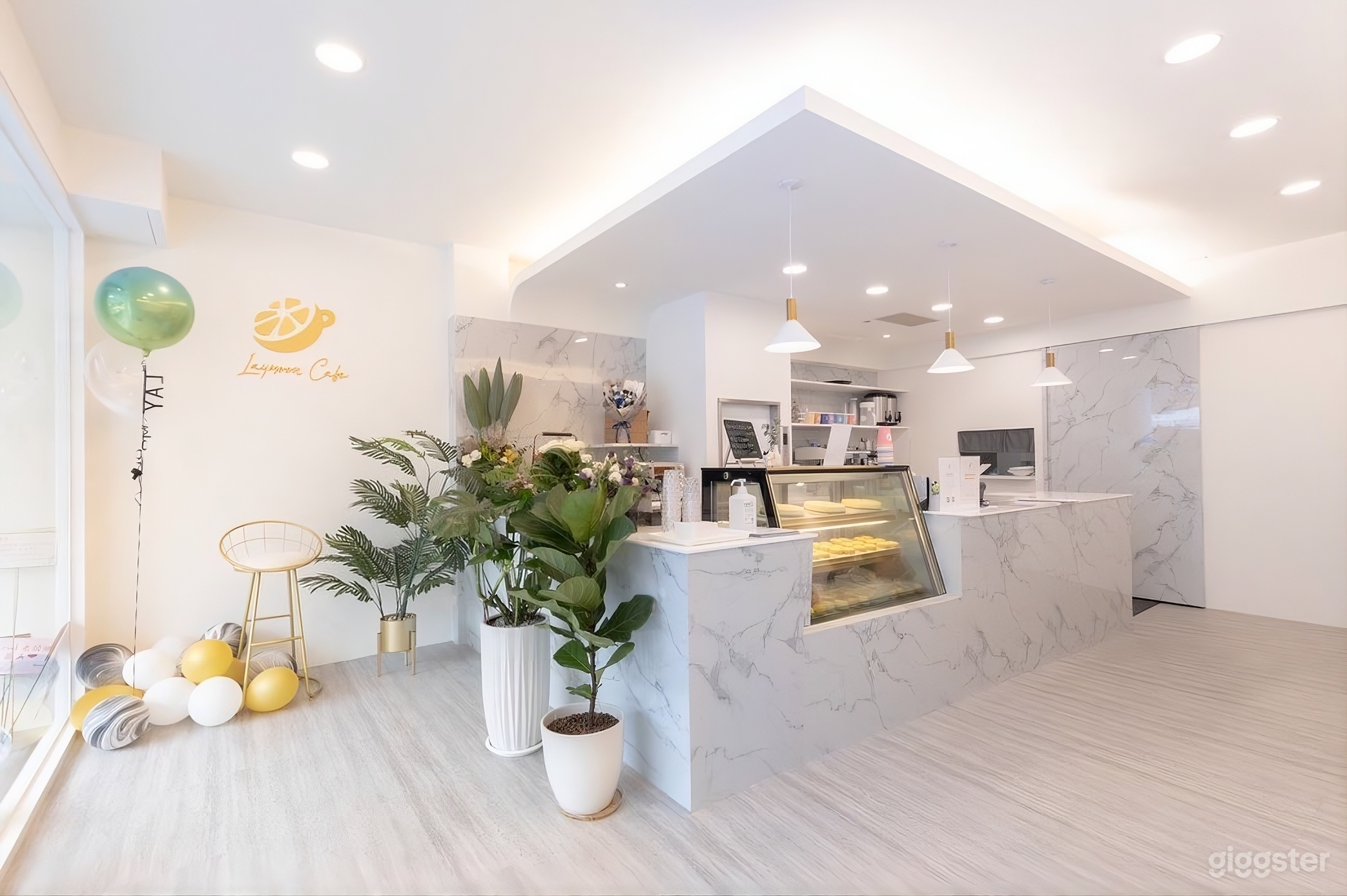 Cafe with White Interior Photo 1