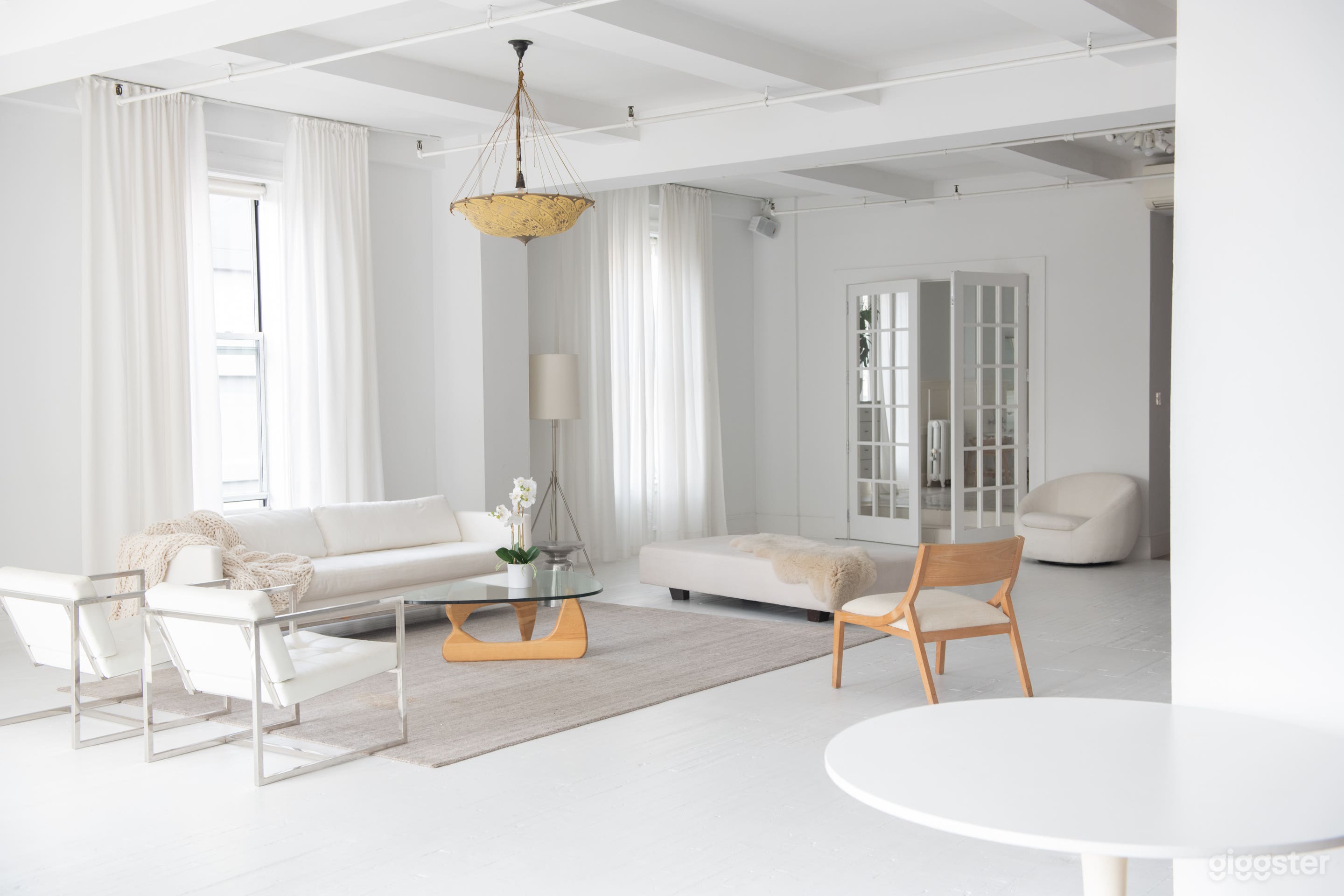 View towards the main open-air, shooting bathroom (through French doors).