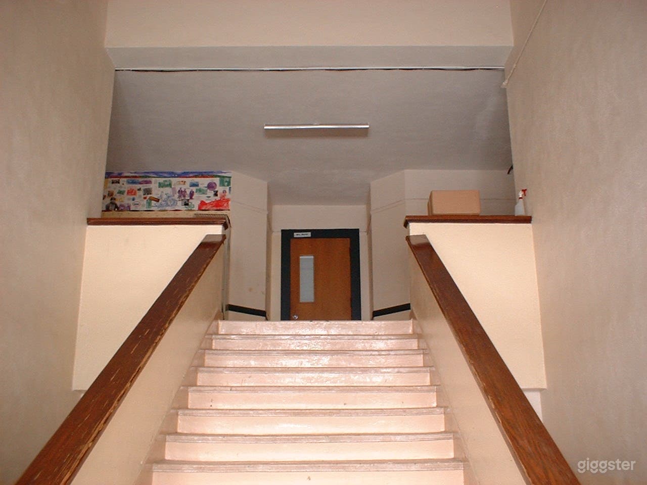 1ST FLOOR MAIN ENTRY LOOKING UP TO 2ND FLOOR