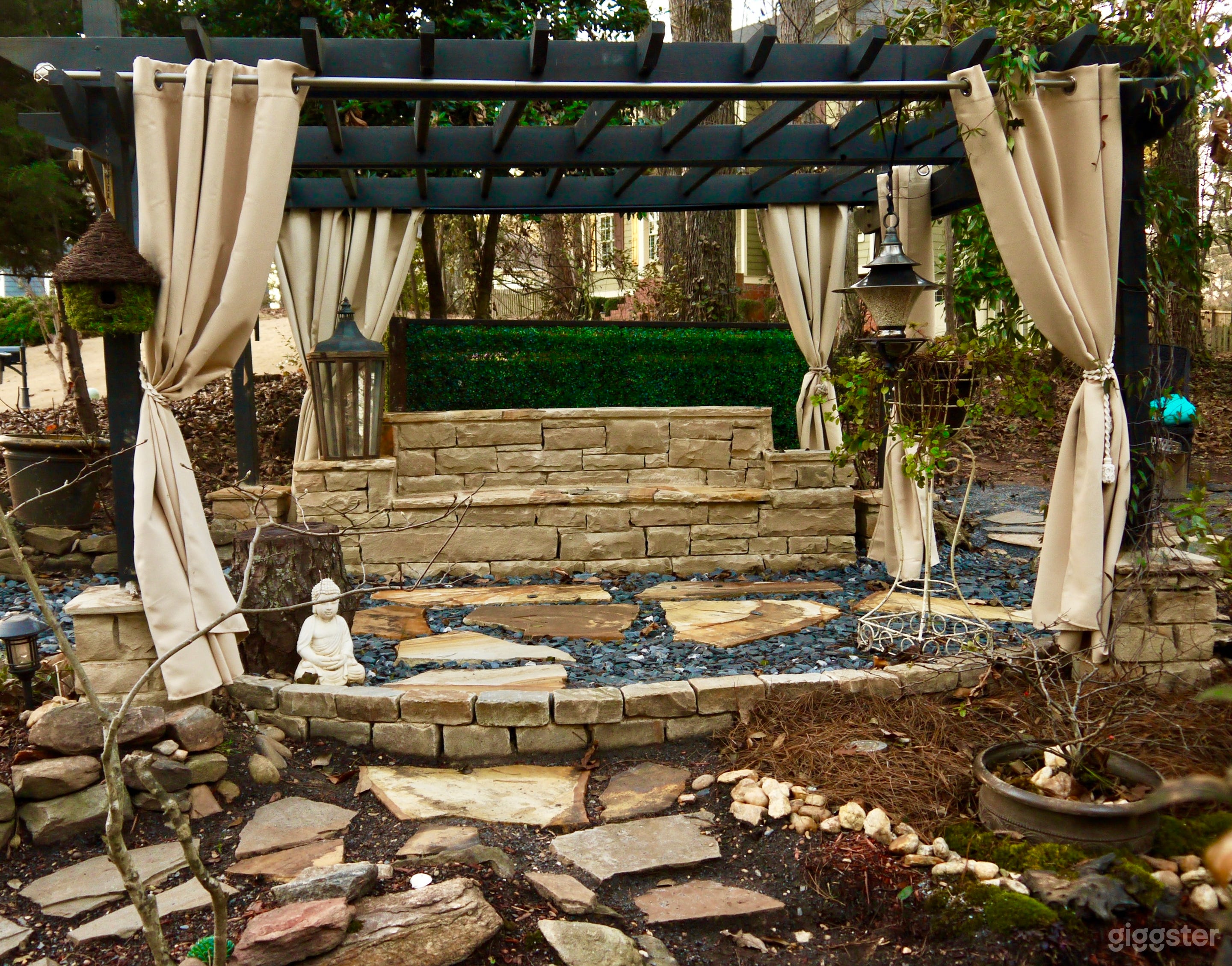 Stone bench under our garden pergola