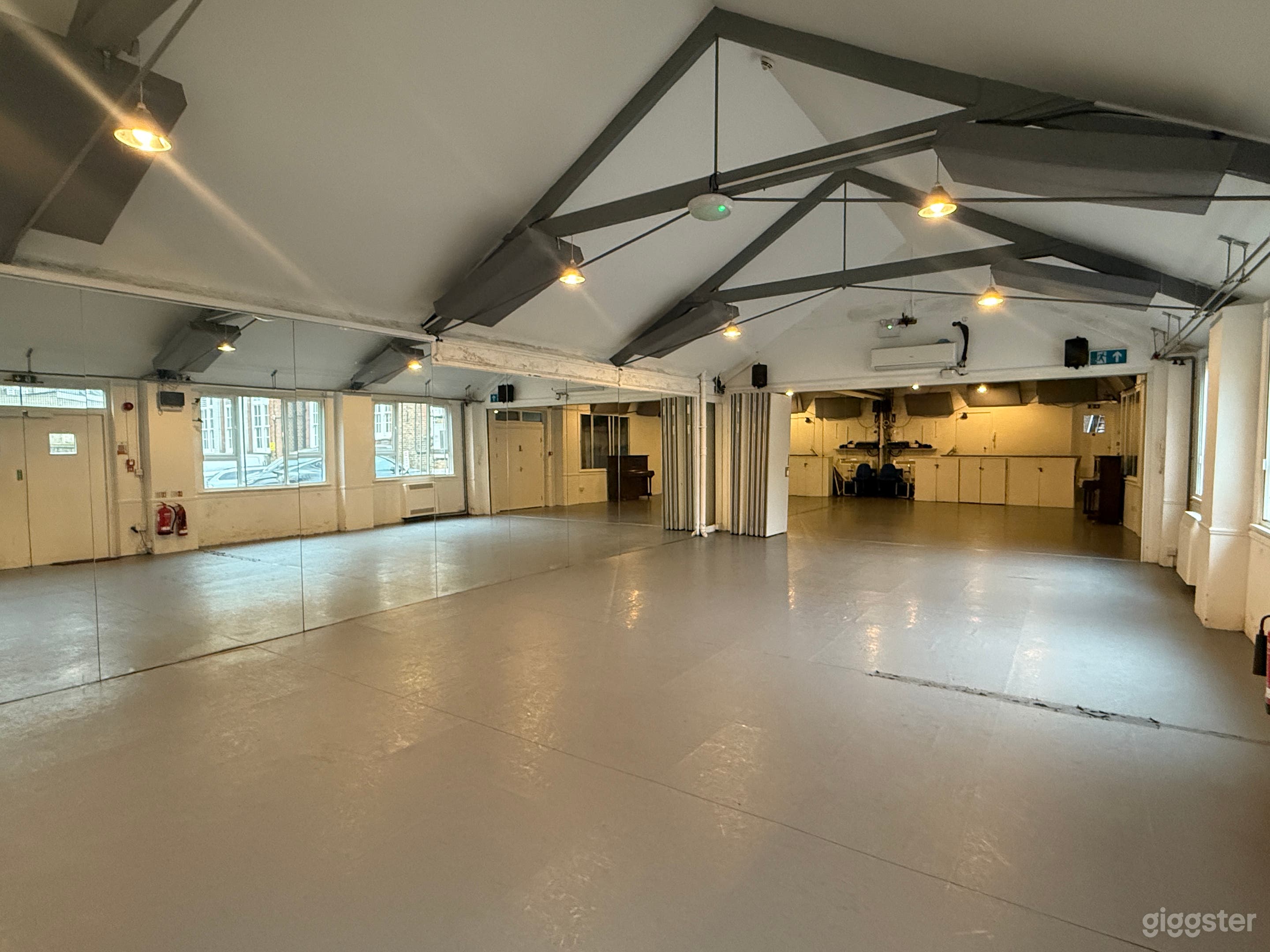 Full studio with great ceilings 
You can see the double doors that can be closed if you need a break out space