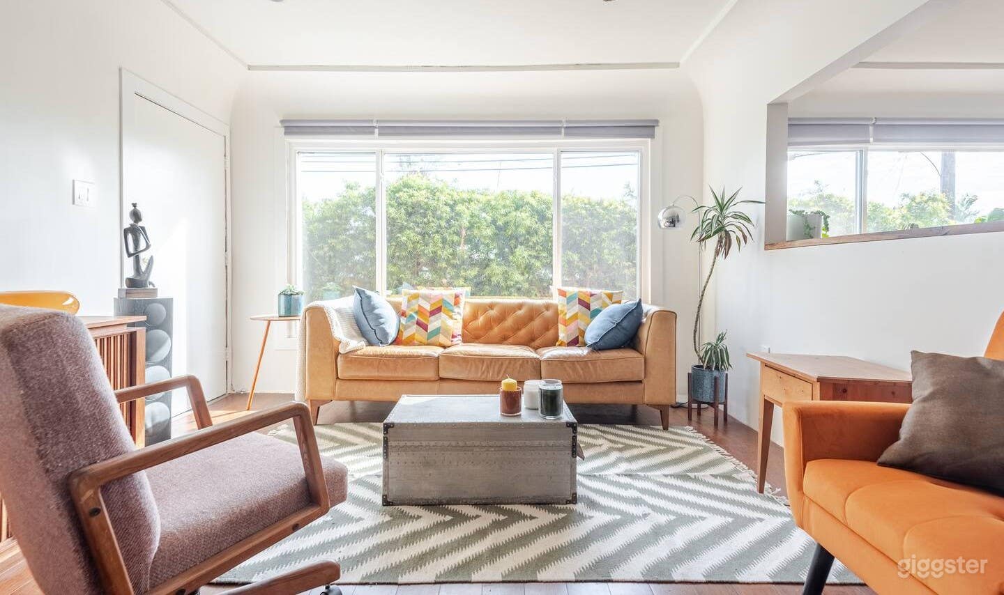 Living room with south-facing windows that allows plenty of natural light.