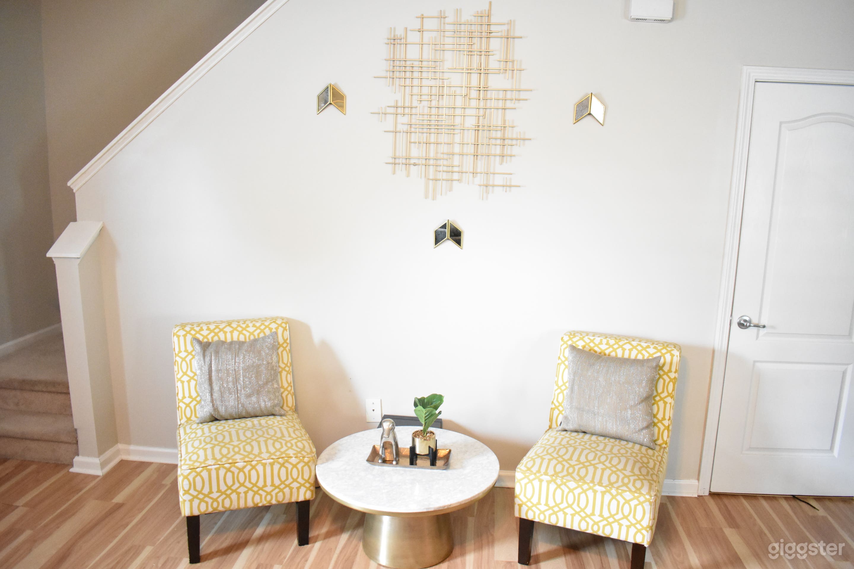 Tea table in the living room with lux wall art  (tea provided)