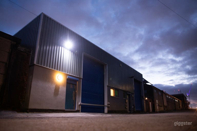  Exterior shot highlighting the loading shutter, facilitating convenient access for larger items and vehicles 