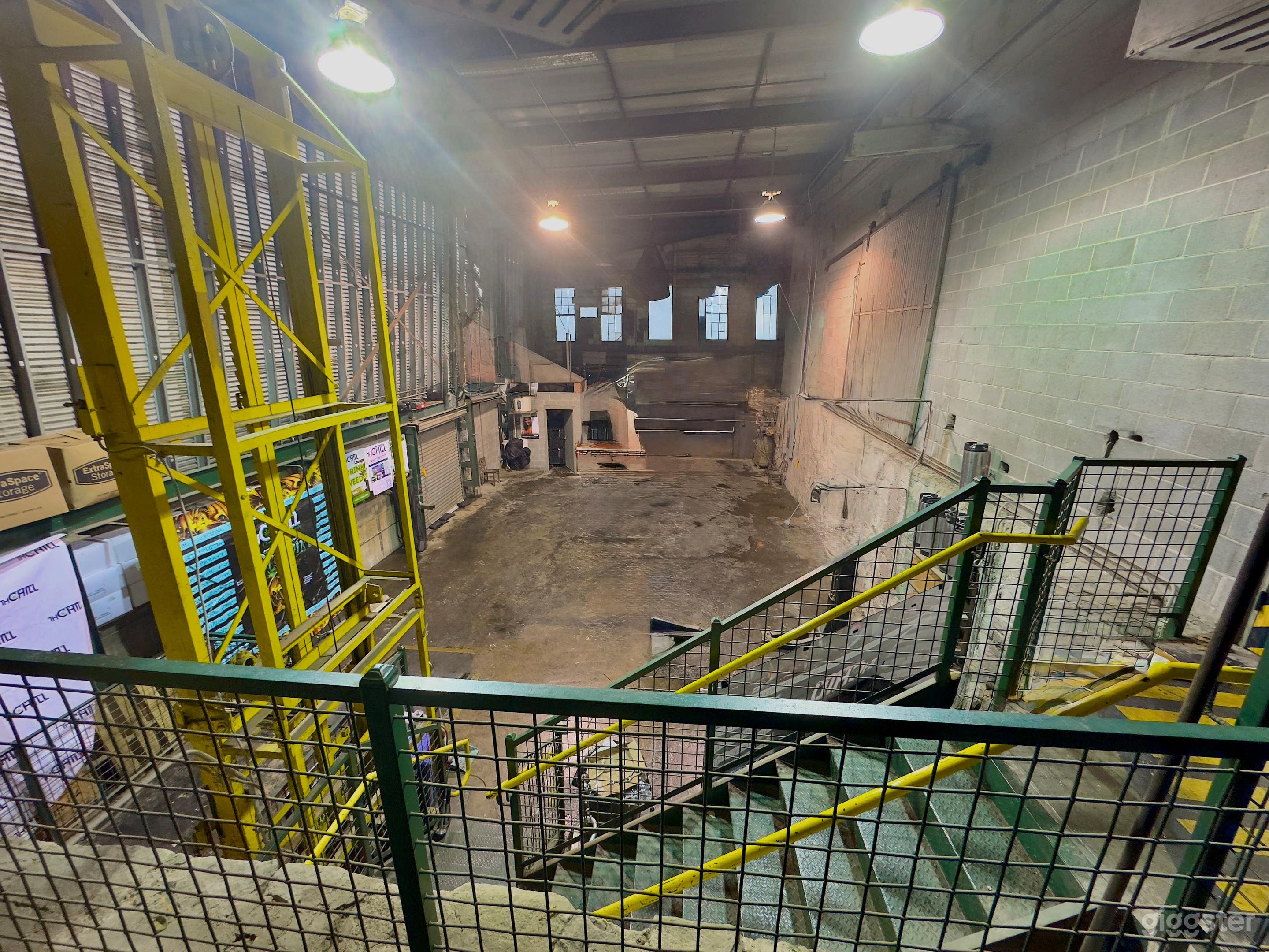 Raw industrial warehouse with towering ceilings and vintage character—perfect for shoots, pop-ups, and creative builds.