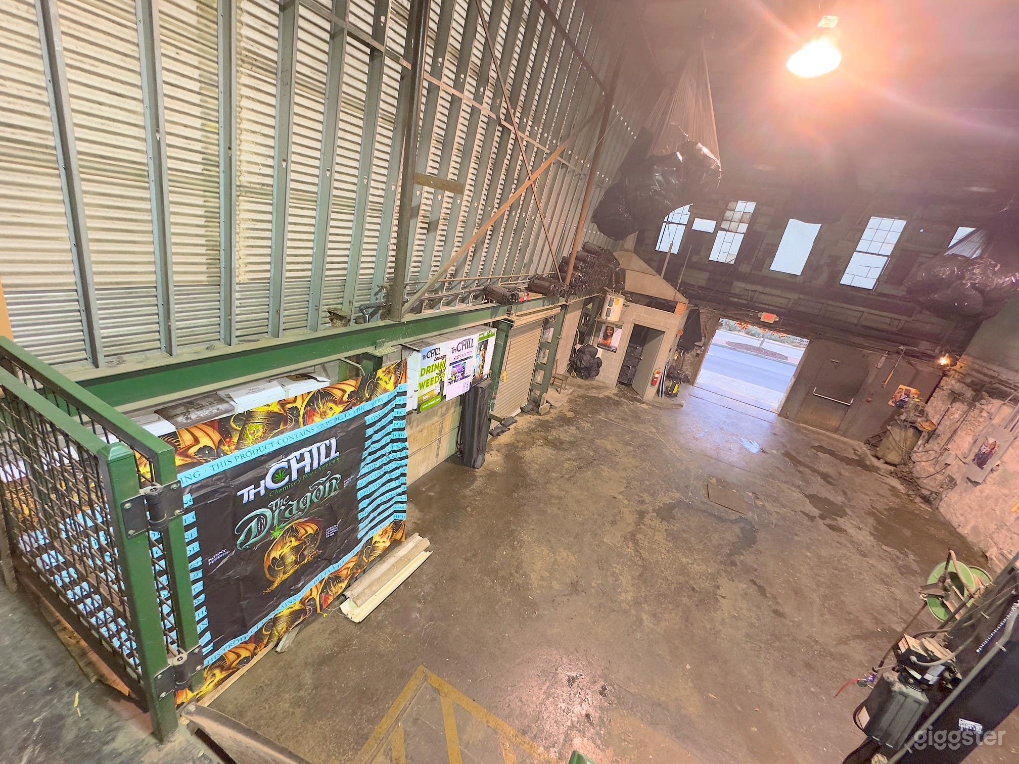 Corrugated steel and custom graphics bring energy to this flexible industrial event space.