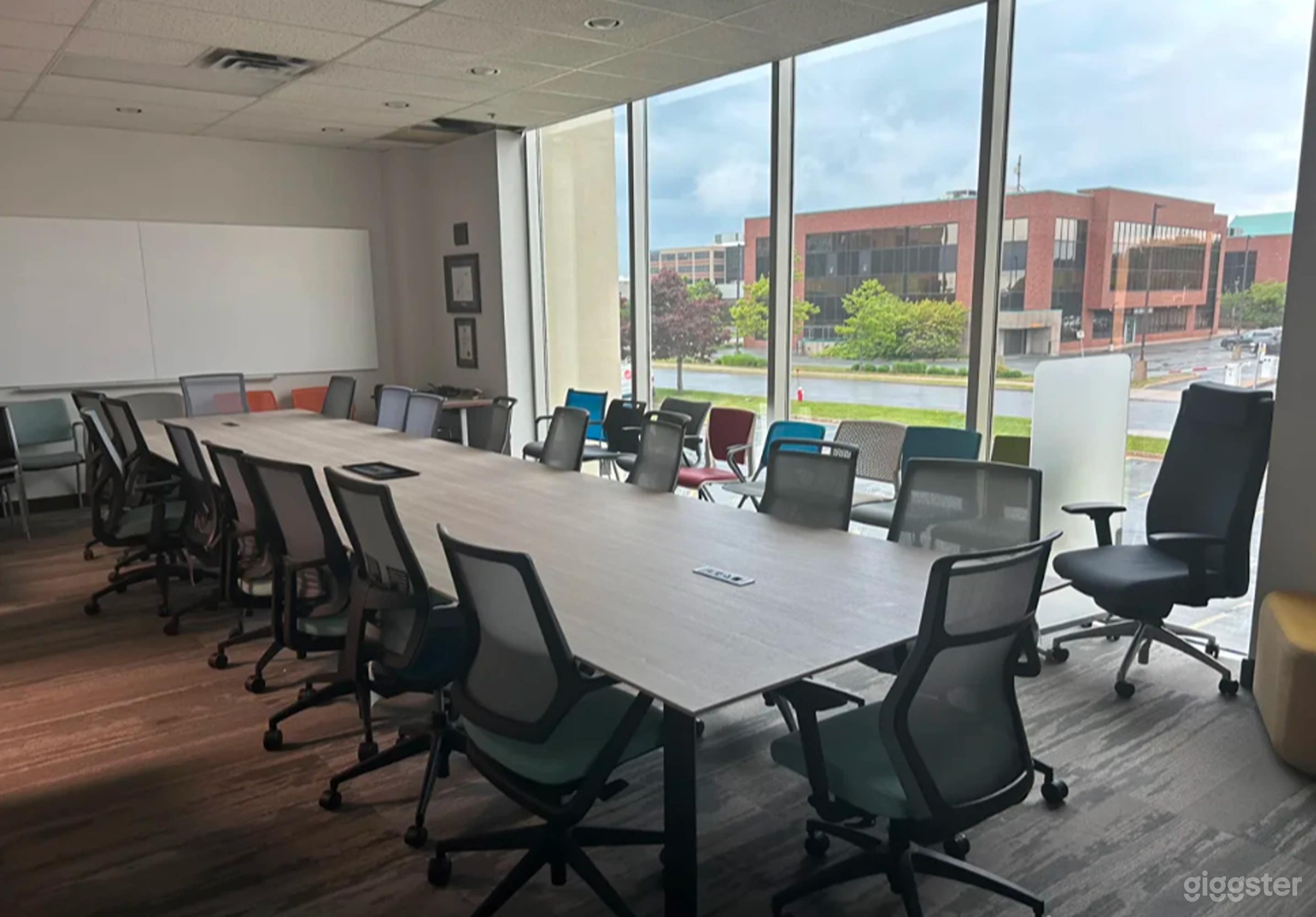 Bright Modern Boardroom with Floor-to-Ceiling Windows Photo 2