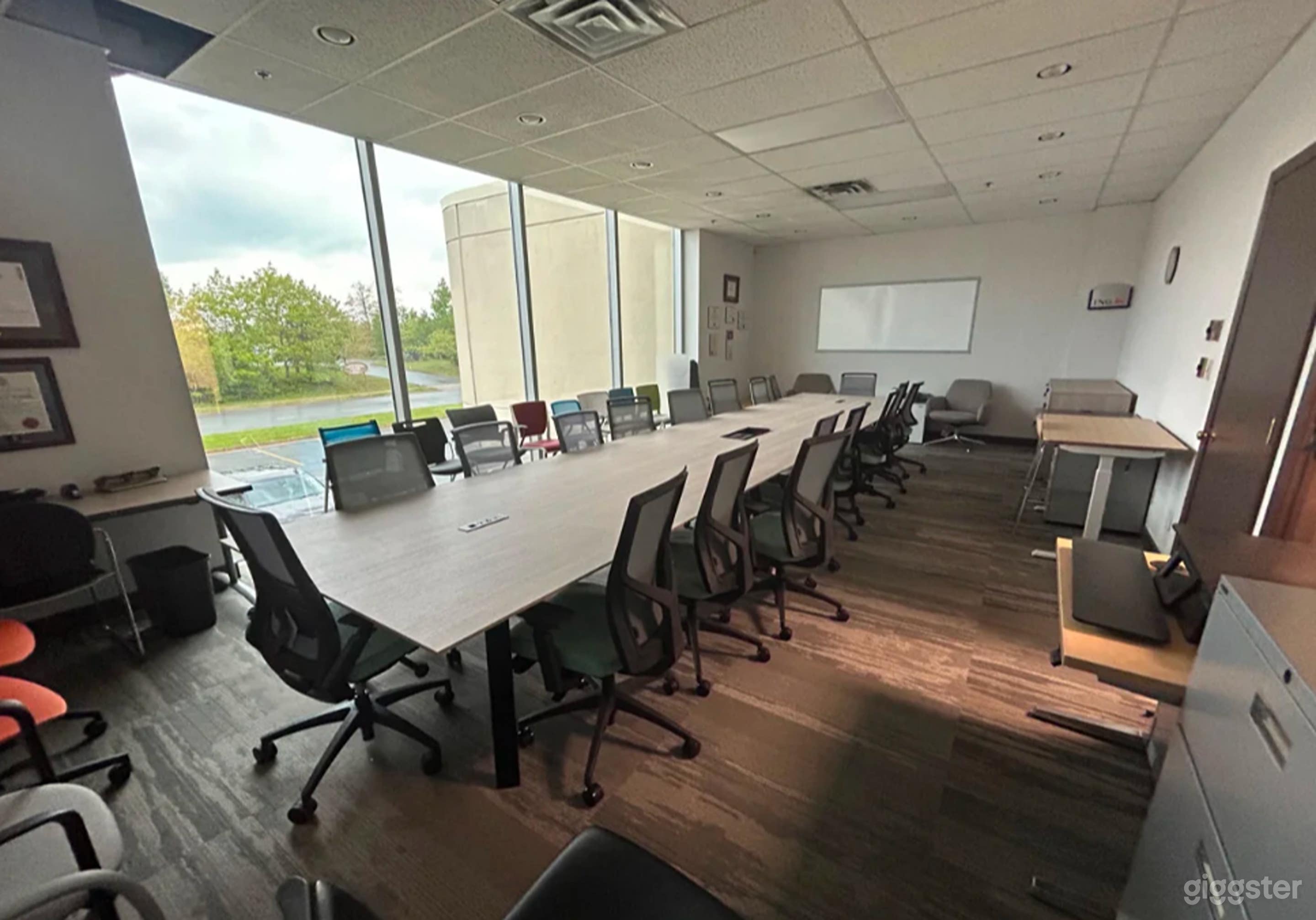 Bright Modern Boardroom with Floor-to-Ceiling Windows Photo 3