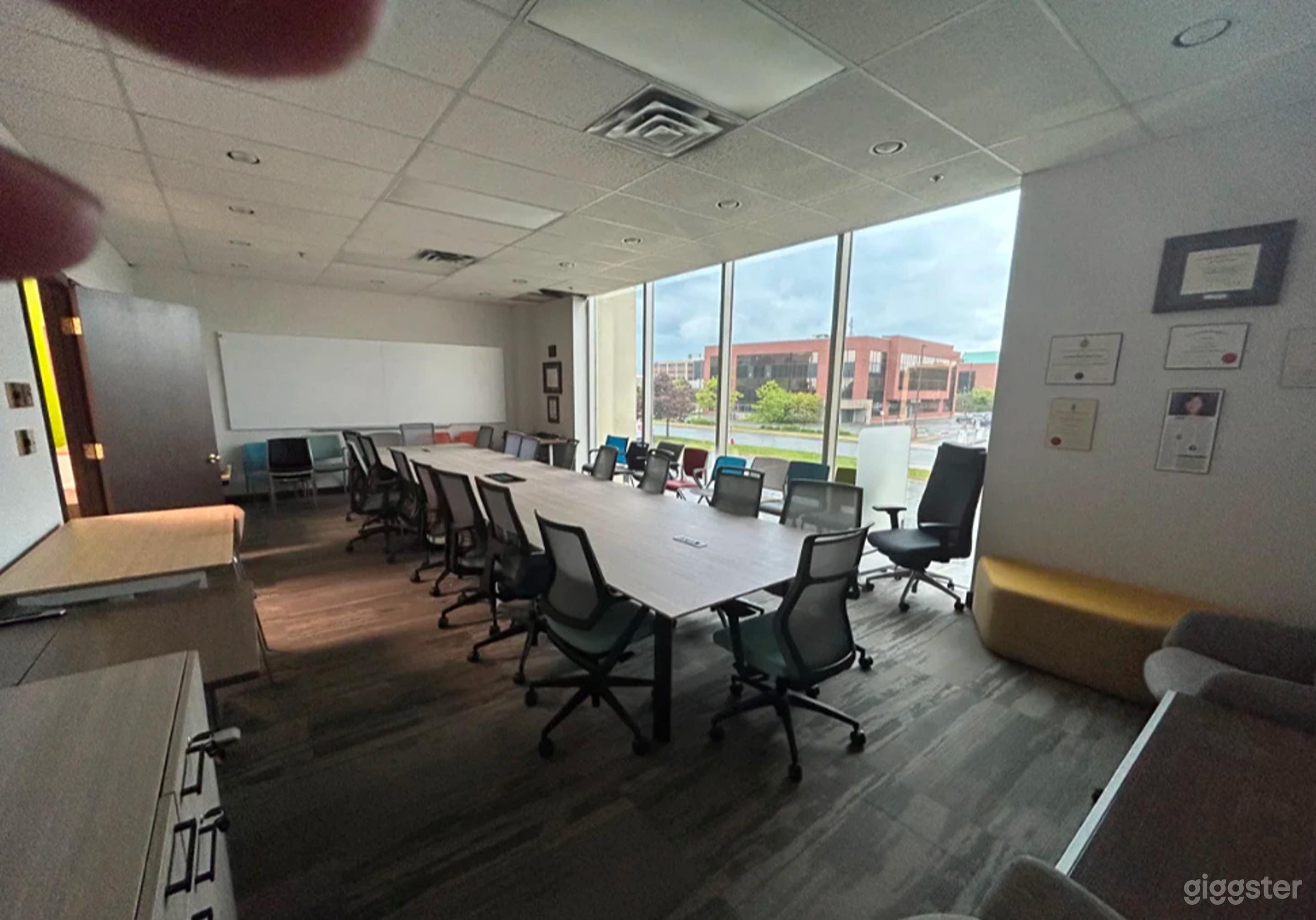 Bright Modern Boardroom with Floor-to-Ceiling Windows Photo 4