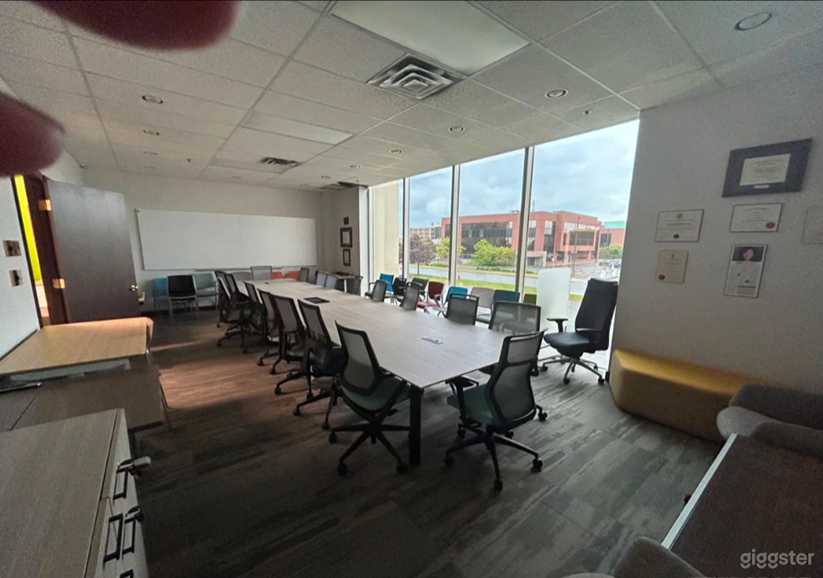 Bright Modern Boardroom with Floor-to-Ceiling Windows Photo 1